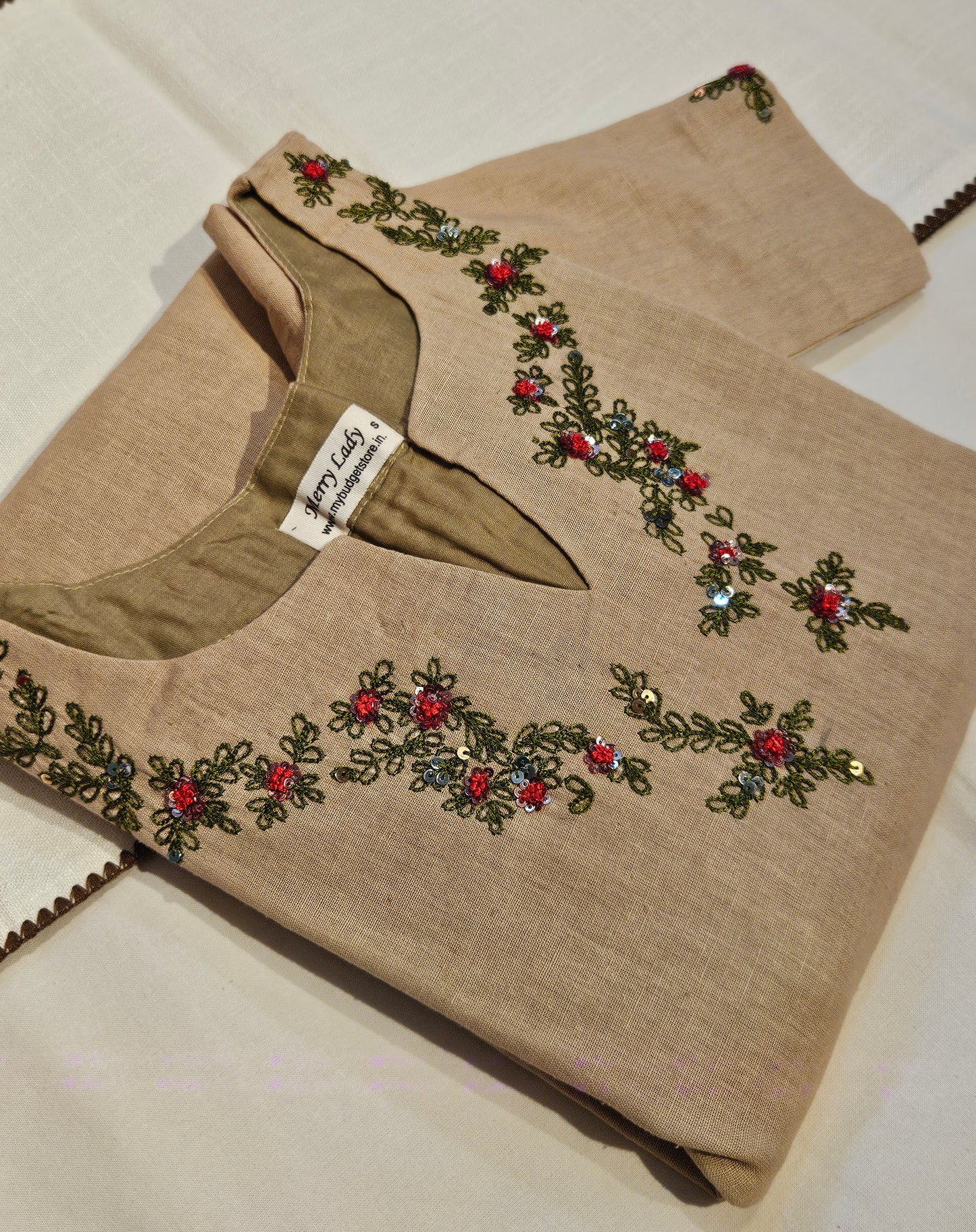 Dark beige cotton flex kurti with green and red handwork detailings on neckline MBS-702