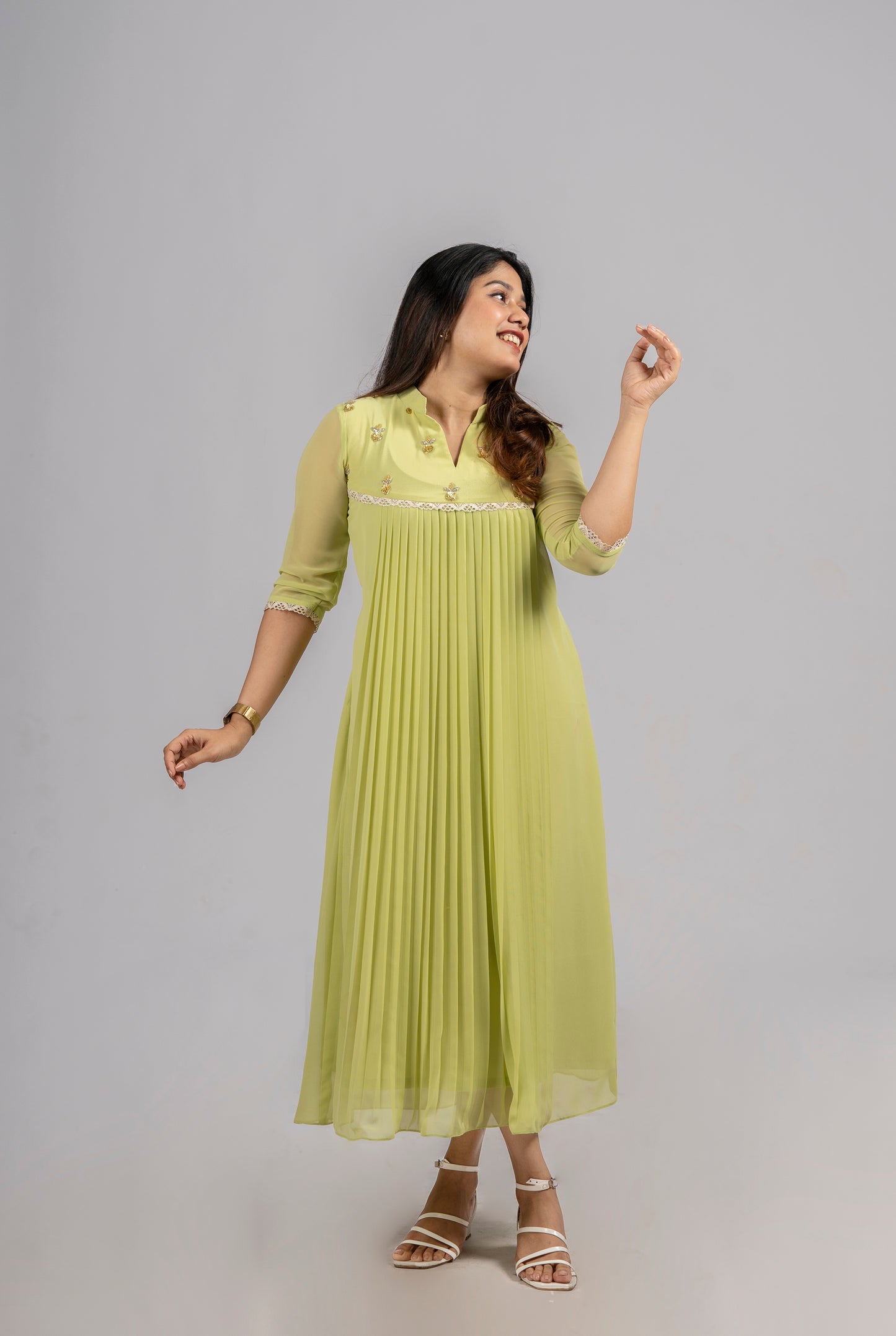 Greenish yellow shaded georgette A-line kurti with handworked yoke and lace detailing MBS-255