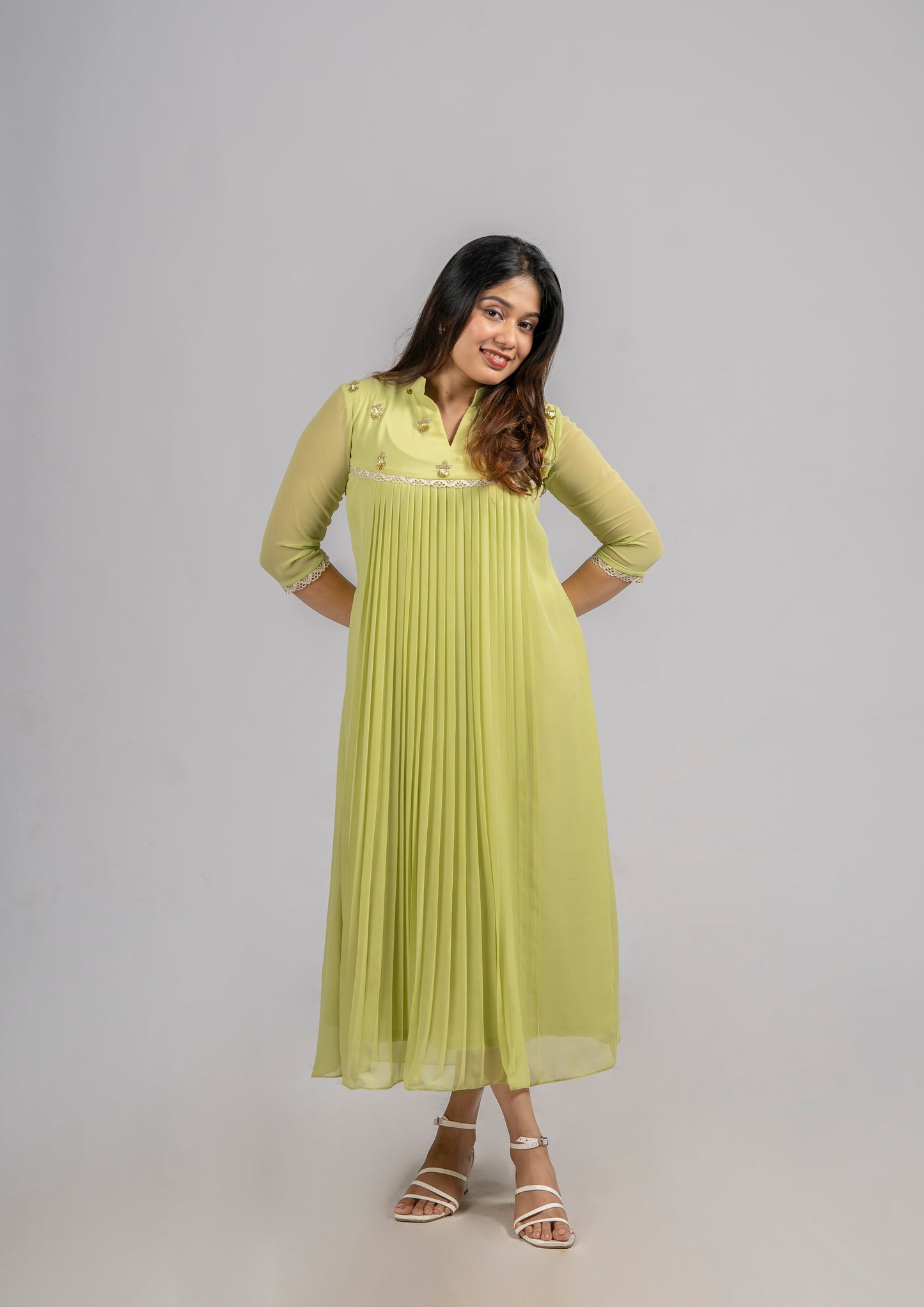 Greenish yellow shaded georgette A-line kurti with handworked yoke and lace detailing MBS-255