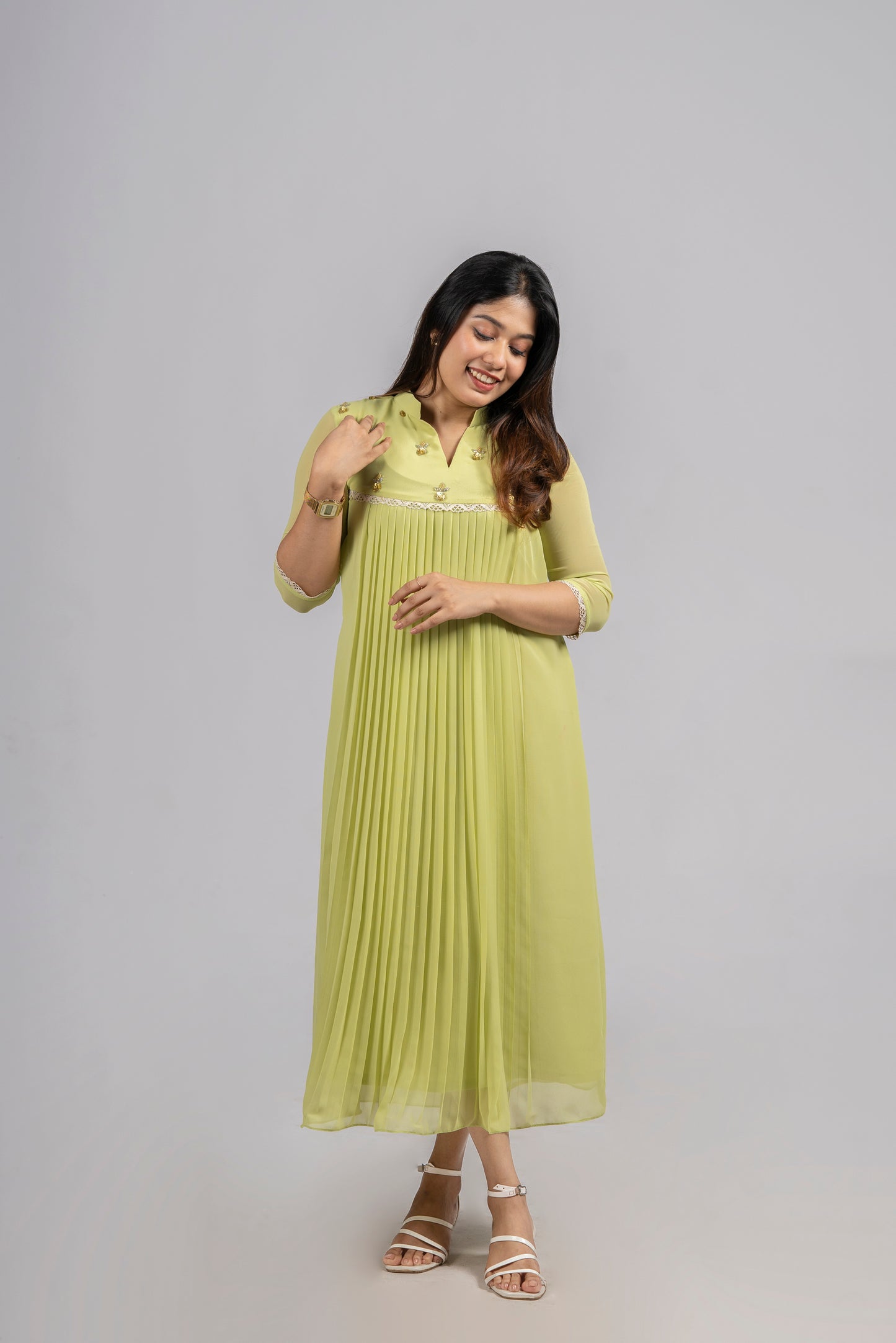 Greenish yellow shaded georgette A-line kurti with handworked yoke and lace detailing MBS-255