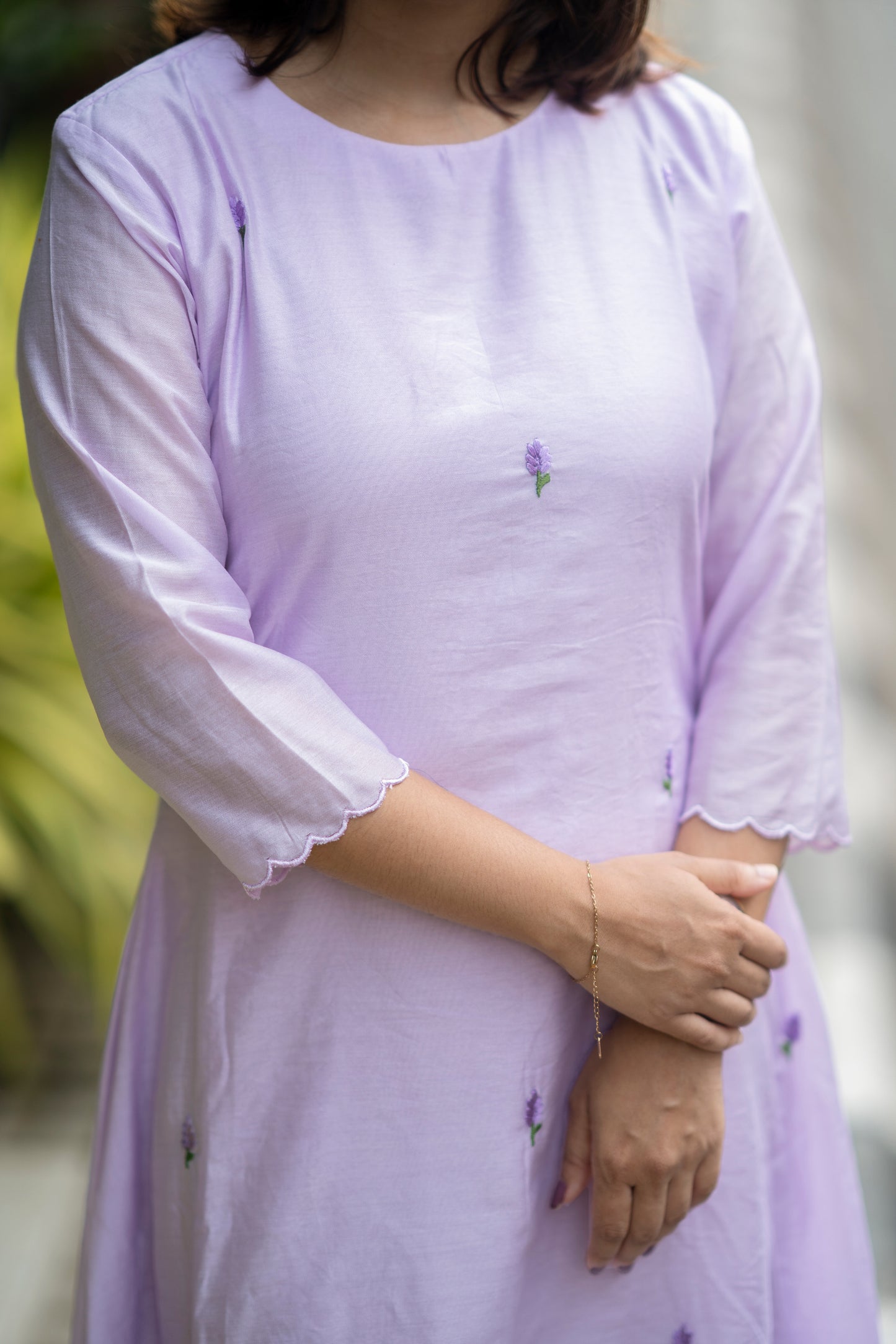 Floral embroidered dola silk Aline kurti with scalloped hemline and sleeve in lavender shade with santoon lining MBS-579