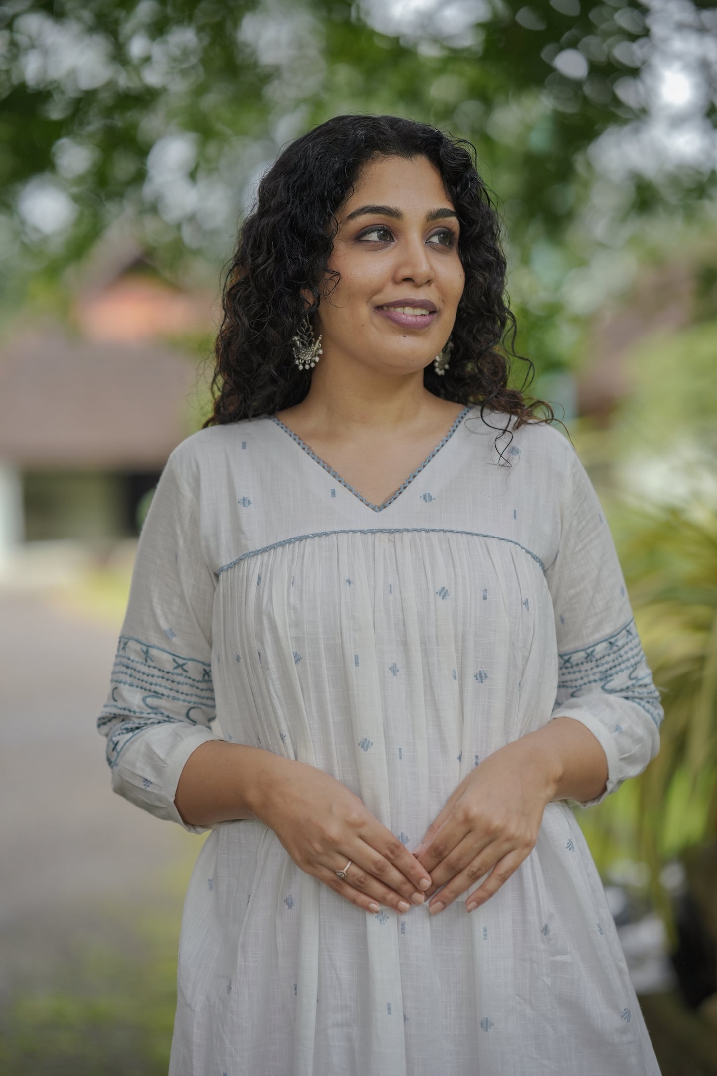 White shaded cotton kurti/dress with embroidered sleeves and crochet lace detailings MBS-649