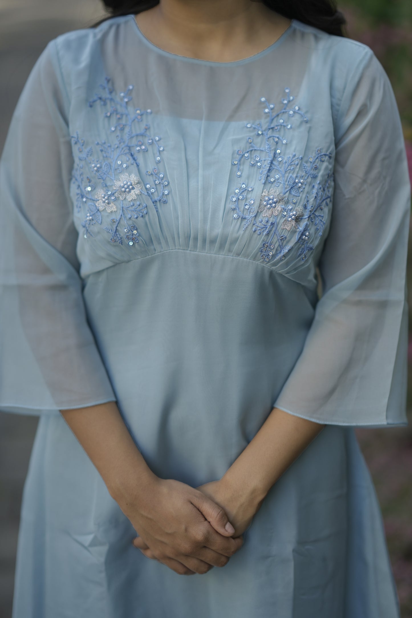 Blue soft organza kurti/dress with pleated yoke detailed with thread embroidery and sequins MBS-704