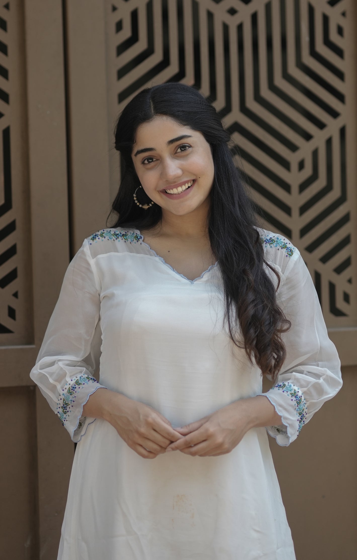 White viscose organza kurti with scalloped neckline and handwork detailings on shoulder and sleeves MBS-705