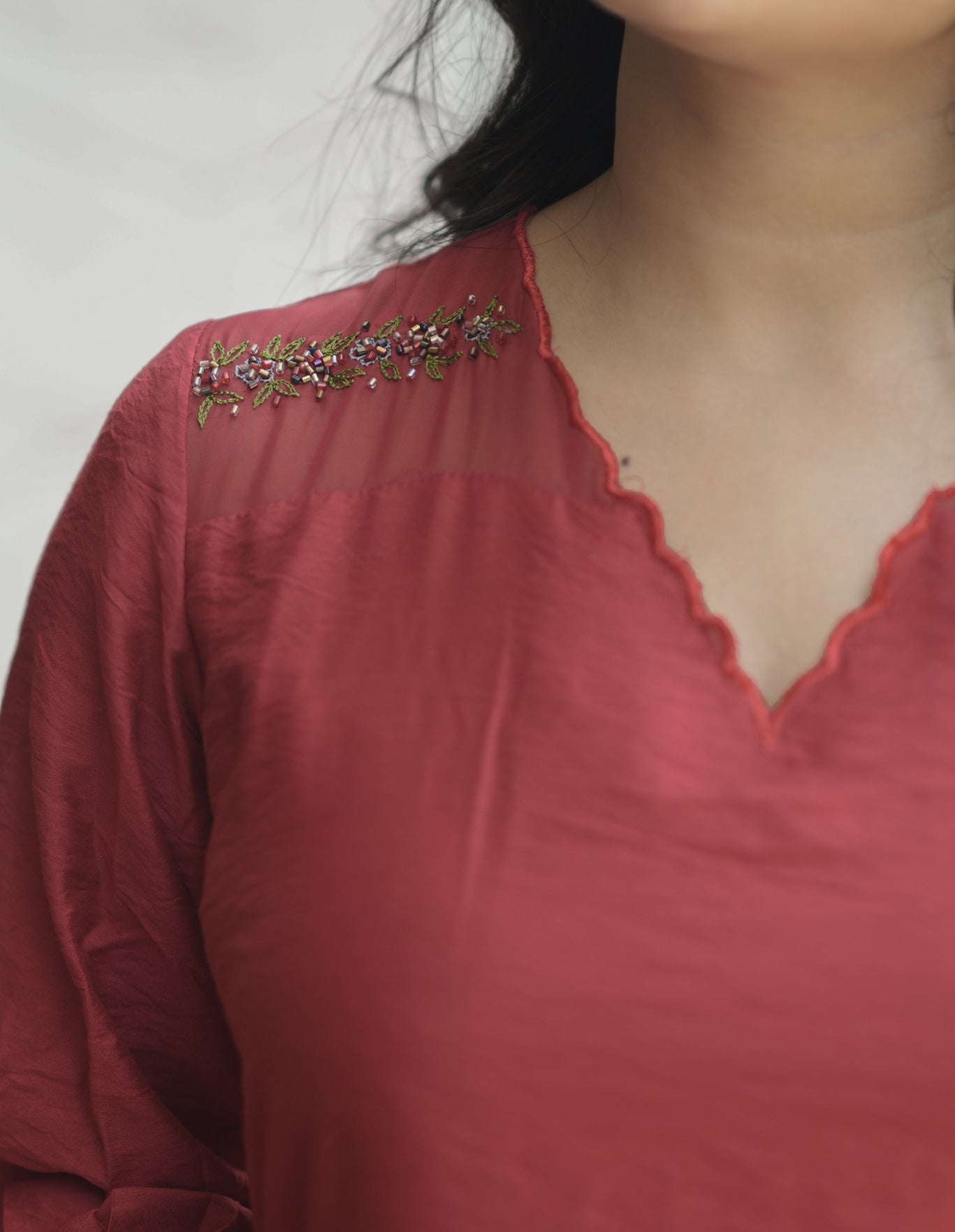 Red viscose organza kurti with scalloped neckline and handwork detailings on shoulder and sleeves MBS-706