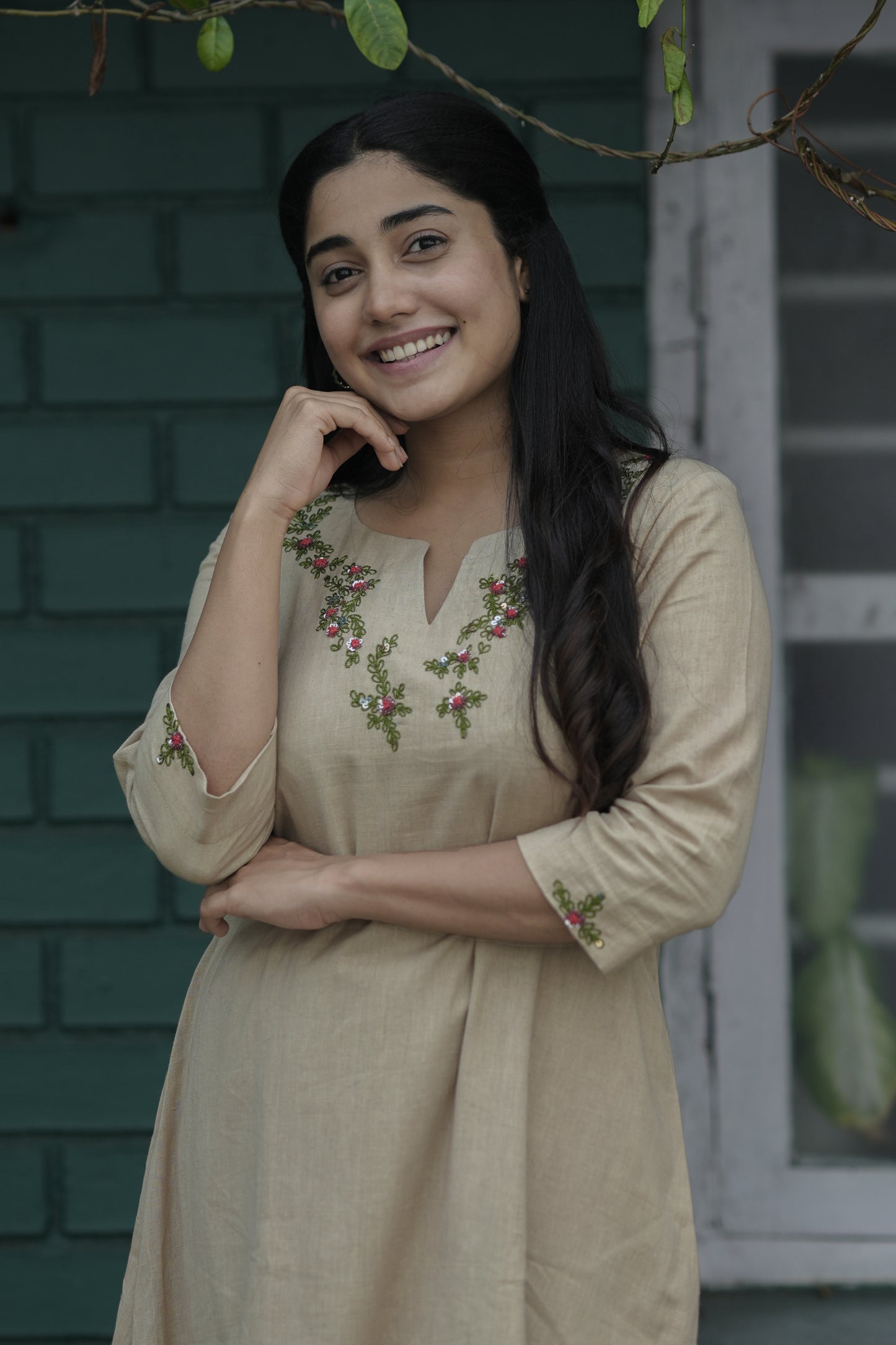 Dark beige cotton flex kurti with green and red handwork detailings on neckline MBS-702