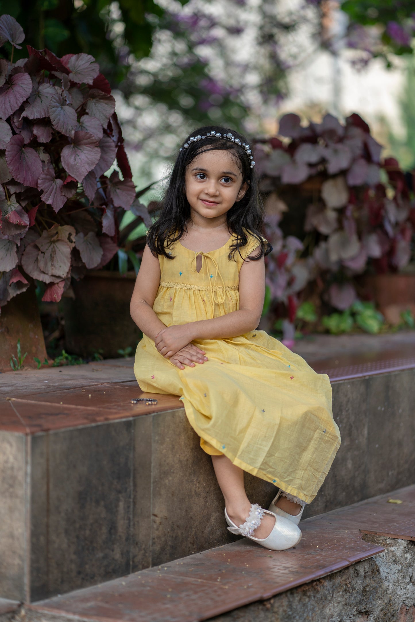 Yellow soft mul cotton kids frock with floral embroidery detailings MBS-350