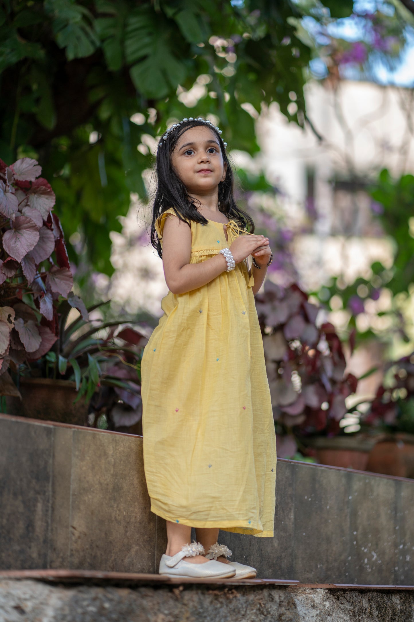Yellow soft mul cotton kids frock with floral embroidery detailings MBS-350