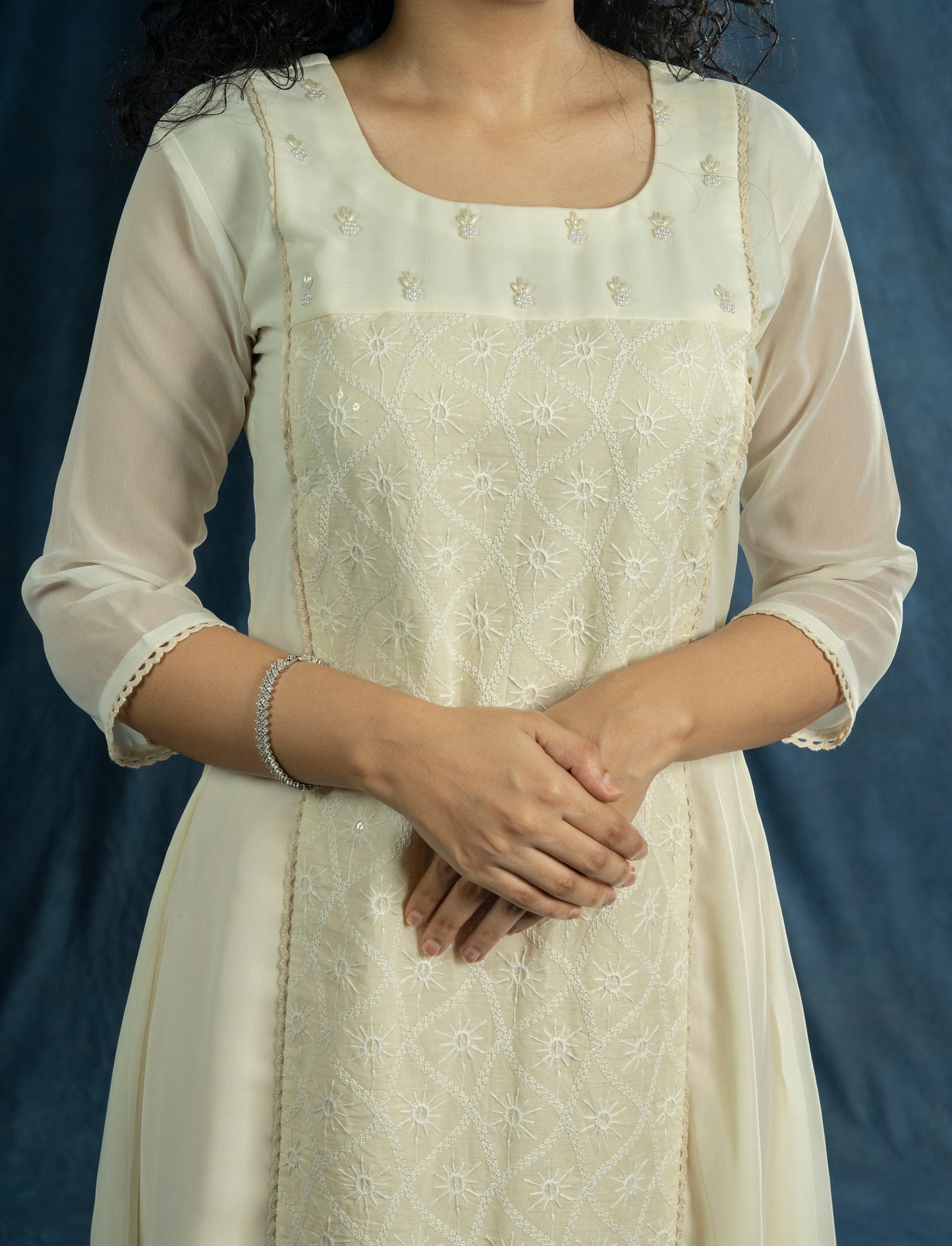 Off-white georgette A-line kurti with handworked neck and chikenkari panel with crochet lace detailing MBS-R199