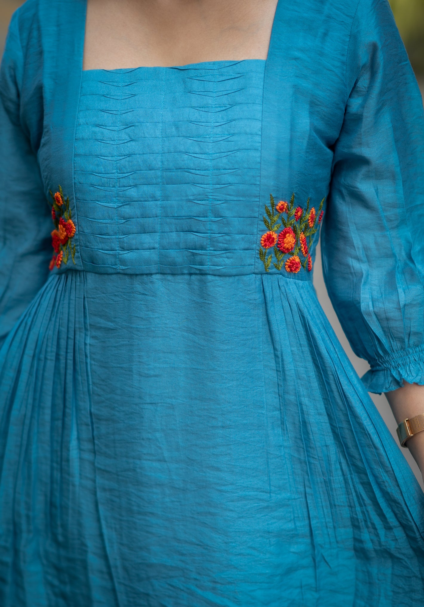 Celeste blue shaded dola silk Aline kurti with curved pleats and thread worked yoke MBS-582