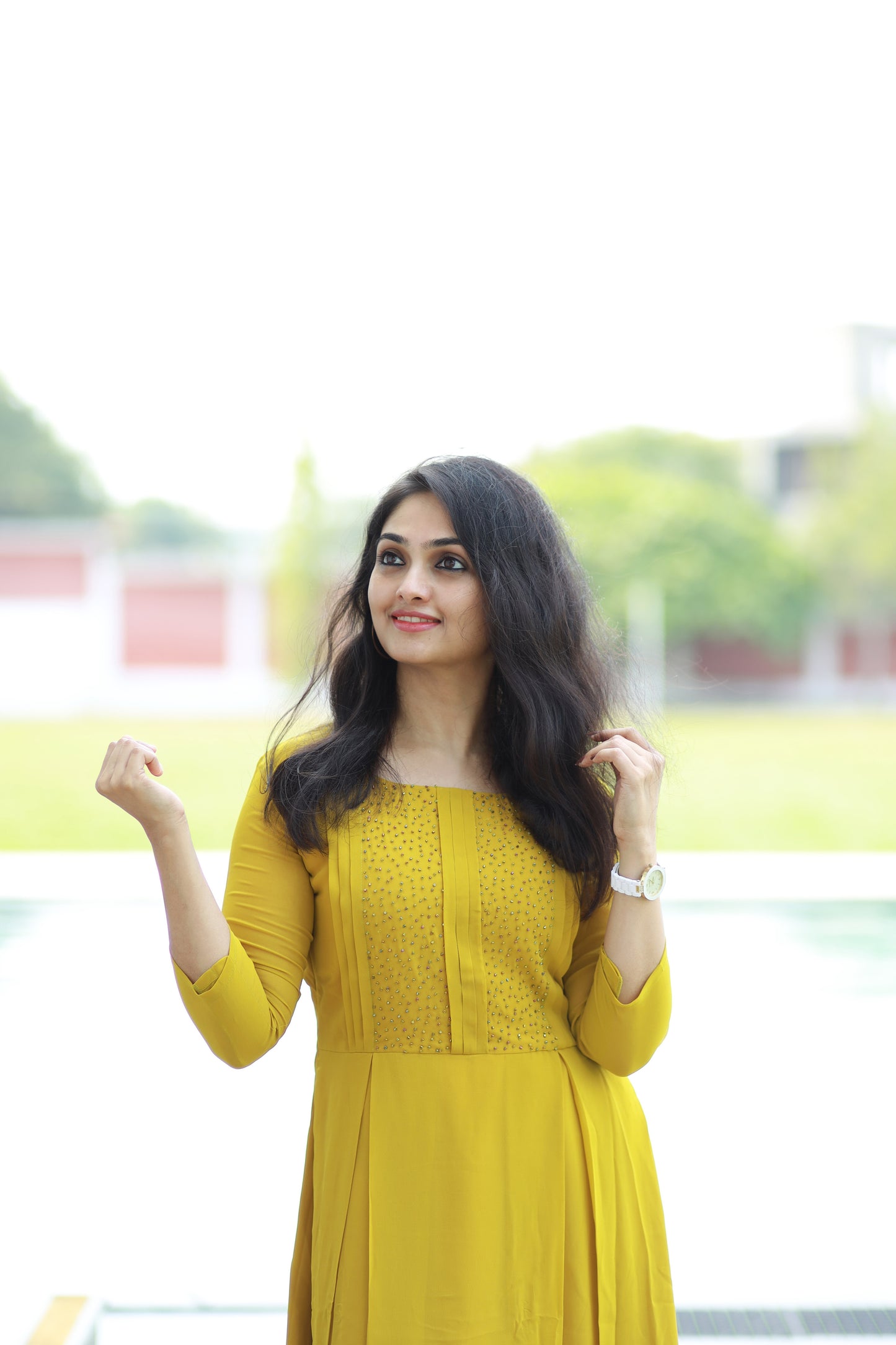 Lemon yellow shaded Georgette Aline Kurti with handwork