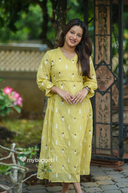 Yellow soft mul cotton Aline kurti/dress with frills and all-over floral embroidery MBS-1195