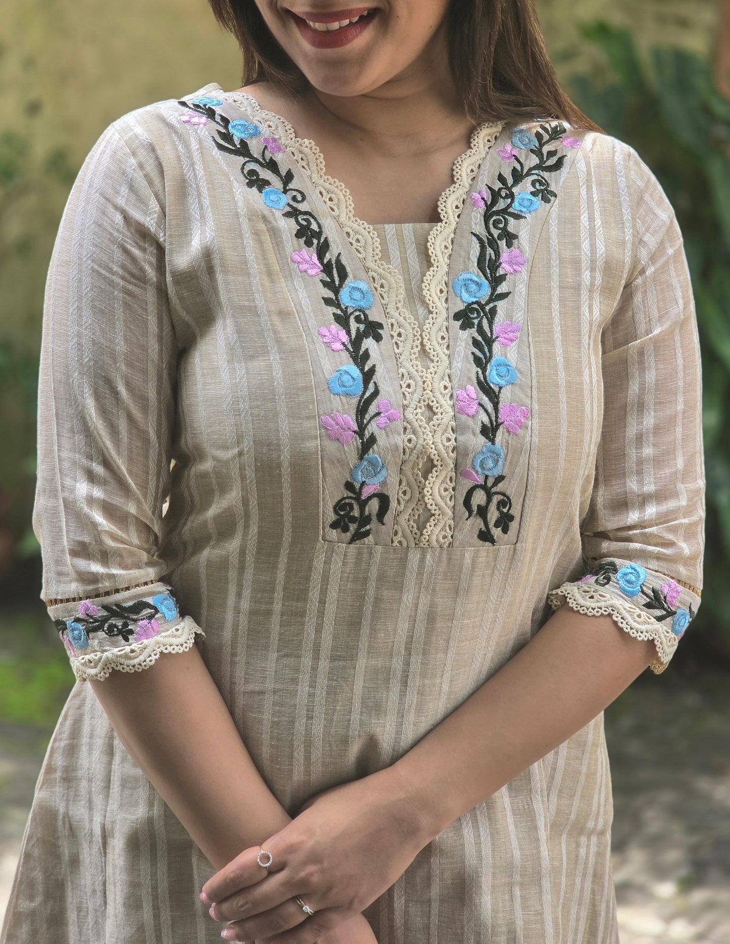 Cream shaded semi jute cotton A-line kurti with floral thread embroidered yoke MBS-763