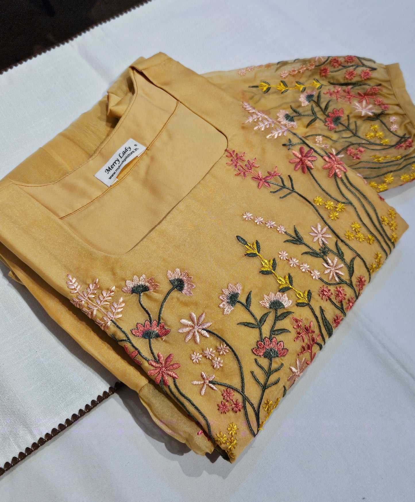 Sandal yellow soft organza kurti with floral embroidery detailings  on yoke and sleeves MBS-701