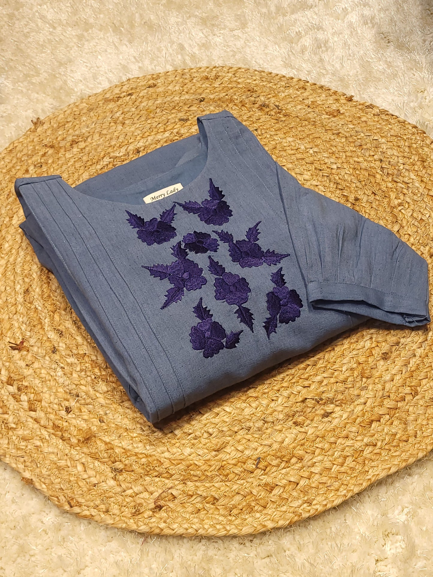 Denim shaded flex cotton Aline kurti/dress with floral embroidered yoke and hemline with pintuck detailing in yoke MBS-782