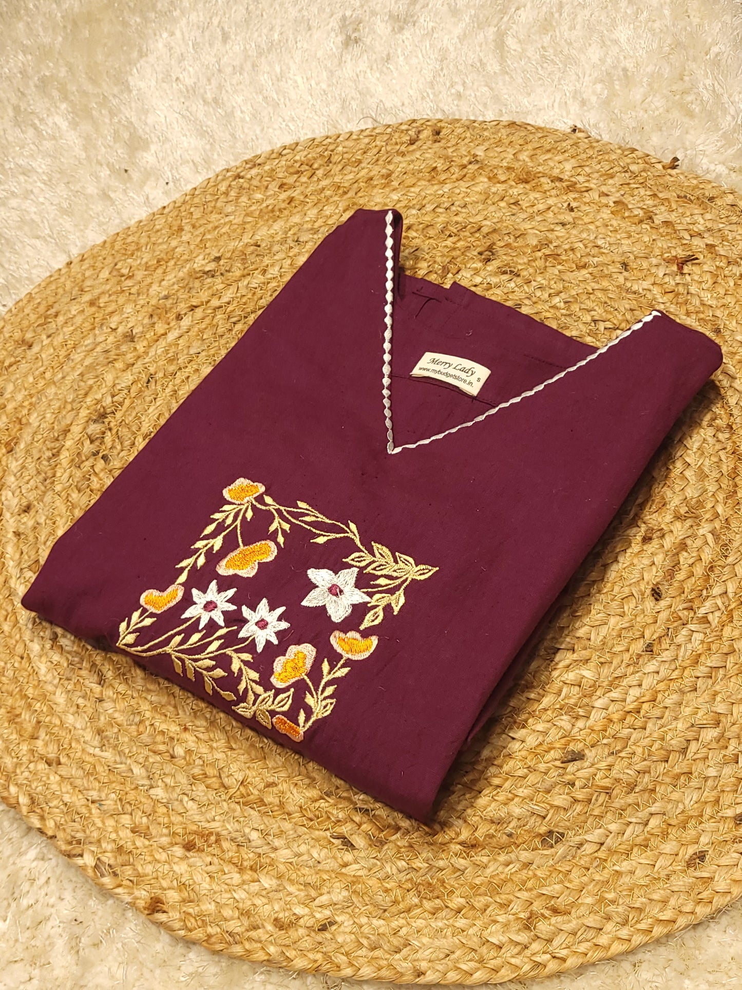 Dark grape flex cotton slitted kurti with embroidery detailings on yoke and hemline MBS-783