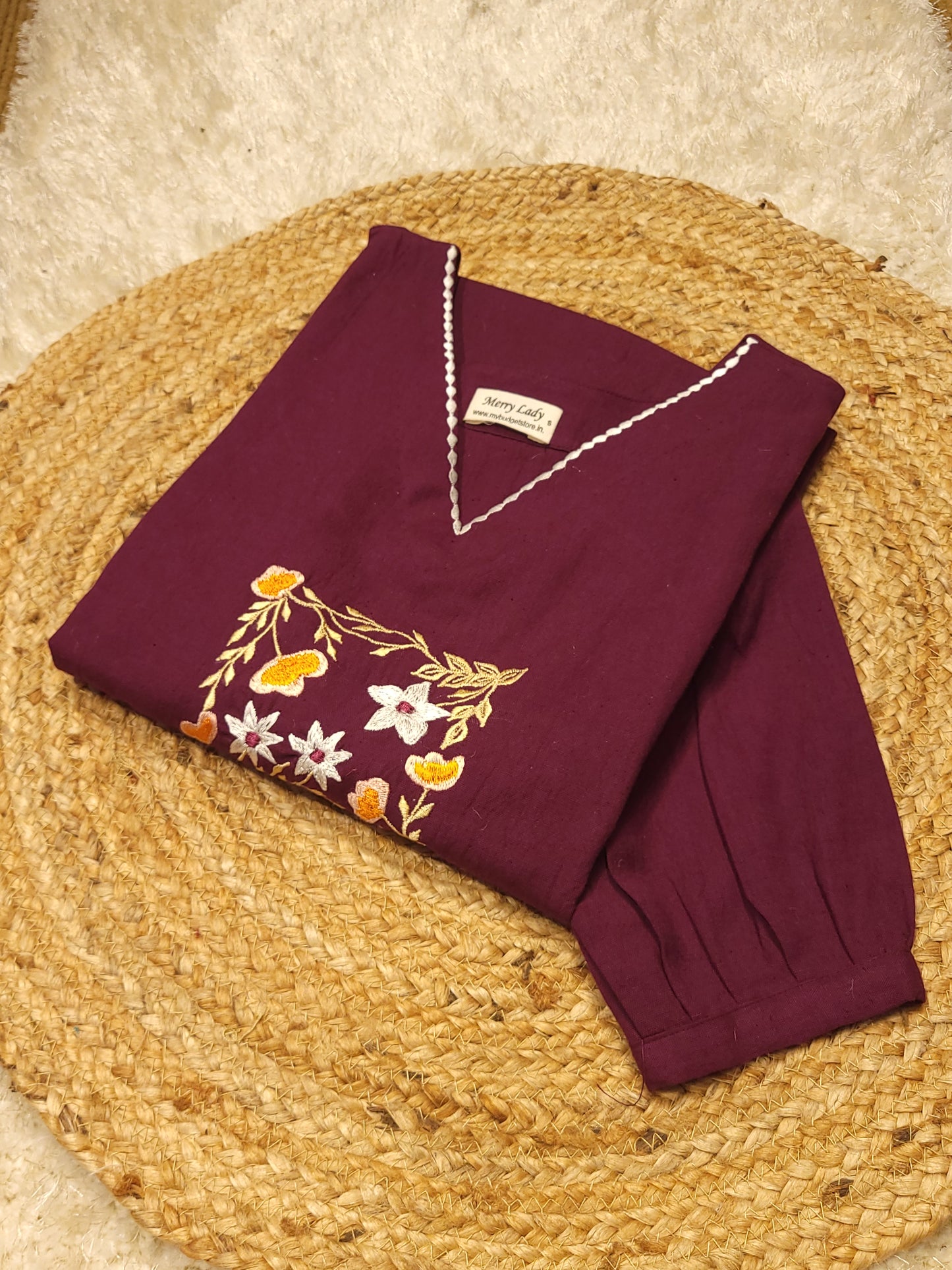 Dark grape flex cotton slitted kurti with embroidery detailings on yoke and hemline MBS-783