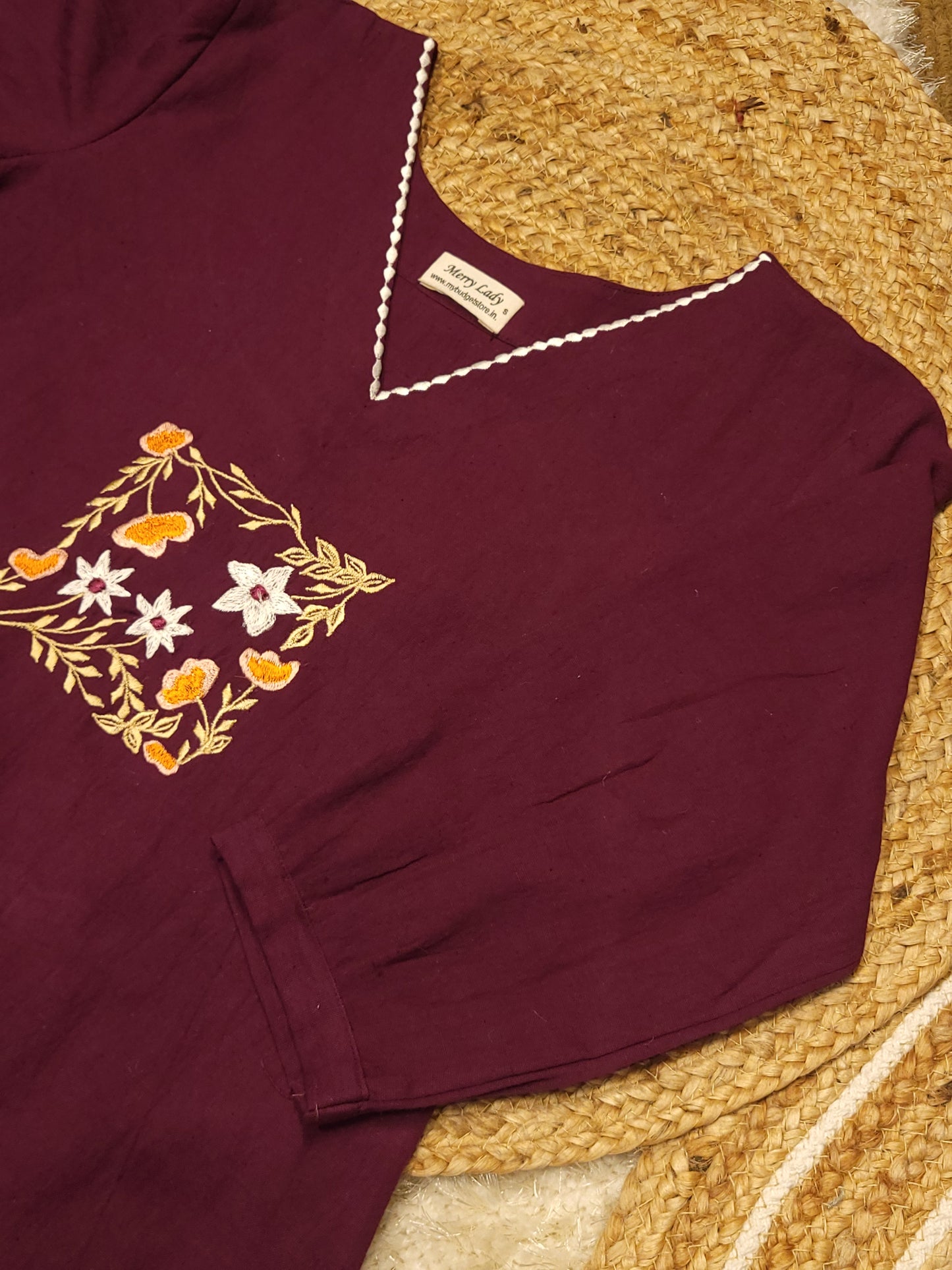 Dark grape flex cotton slitted kurti with embroidery detailings on yoke and hemline MBS-783