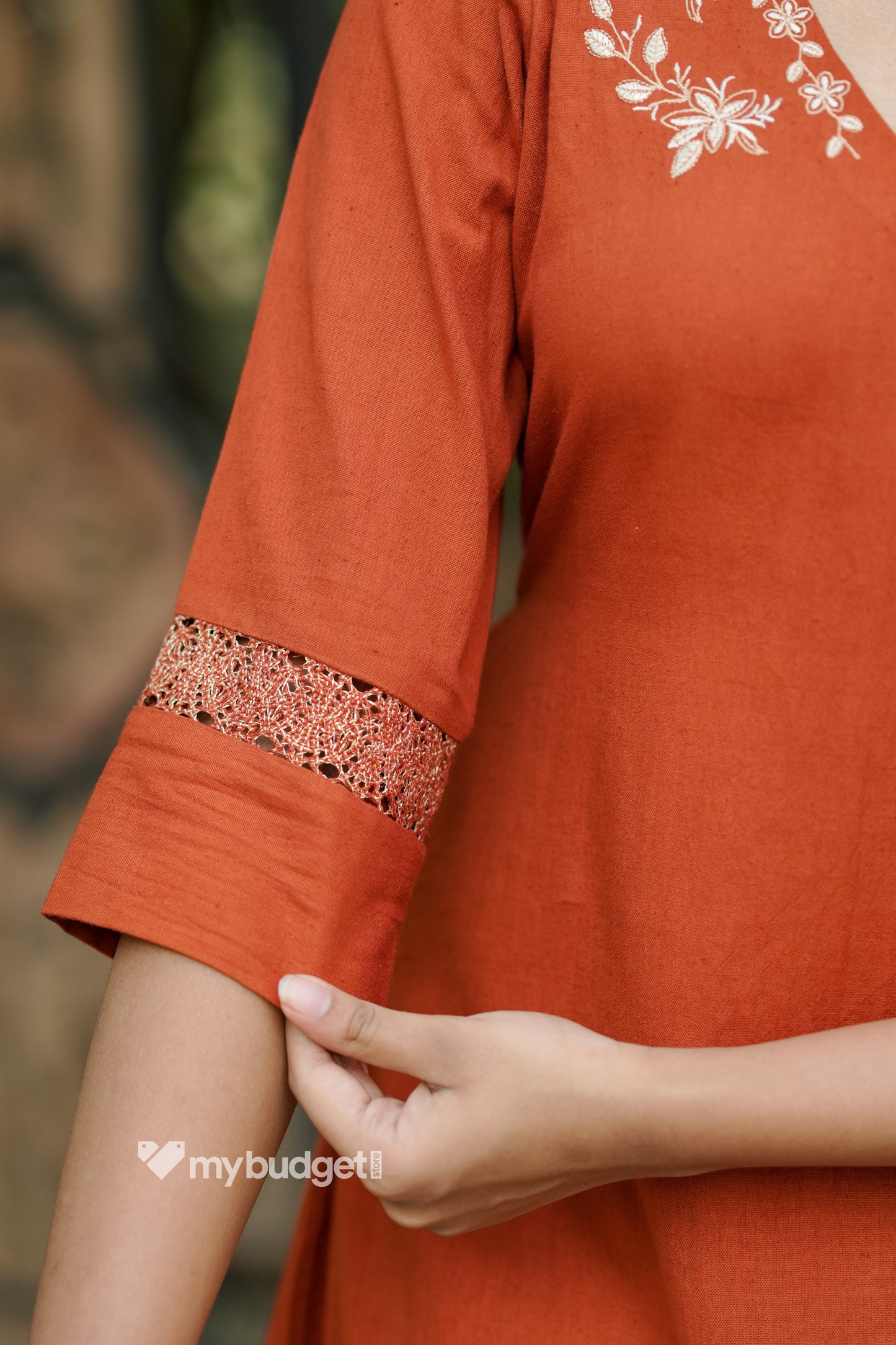 Rust orange cotton flex kurti with embroidery detailings on neck MBS-842