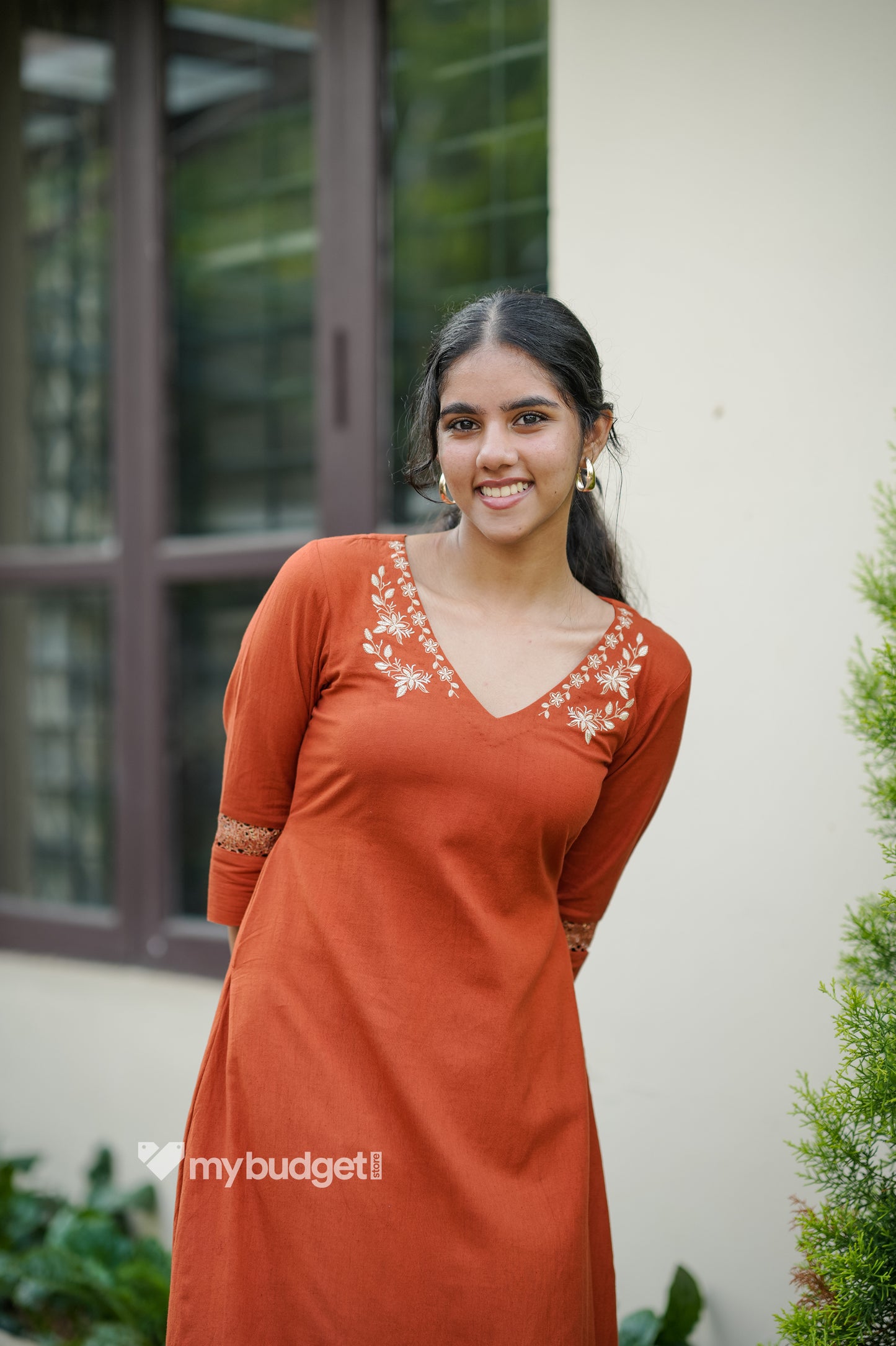 Rust orange cotton flex kurti with embroidery detailings on neck MBS-842