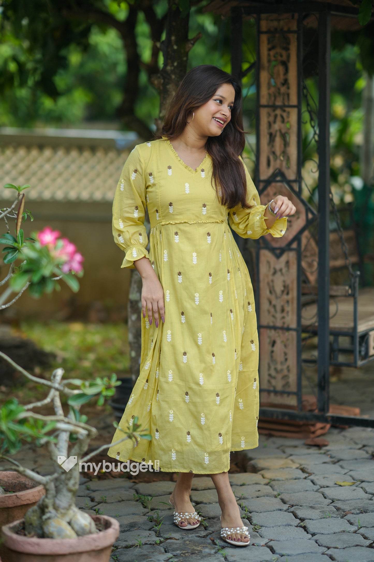 Yellow soft mul cotton Aline kurti/dress with frills and all-over floral embroidery MBS-1195