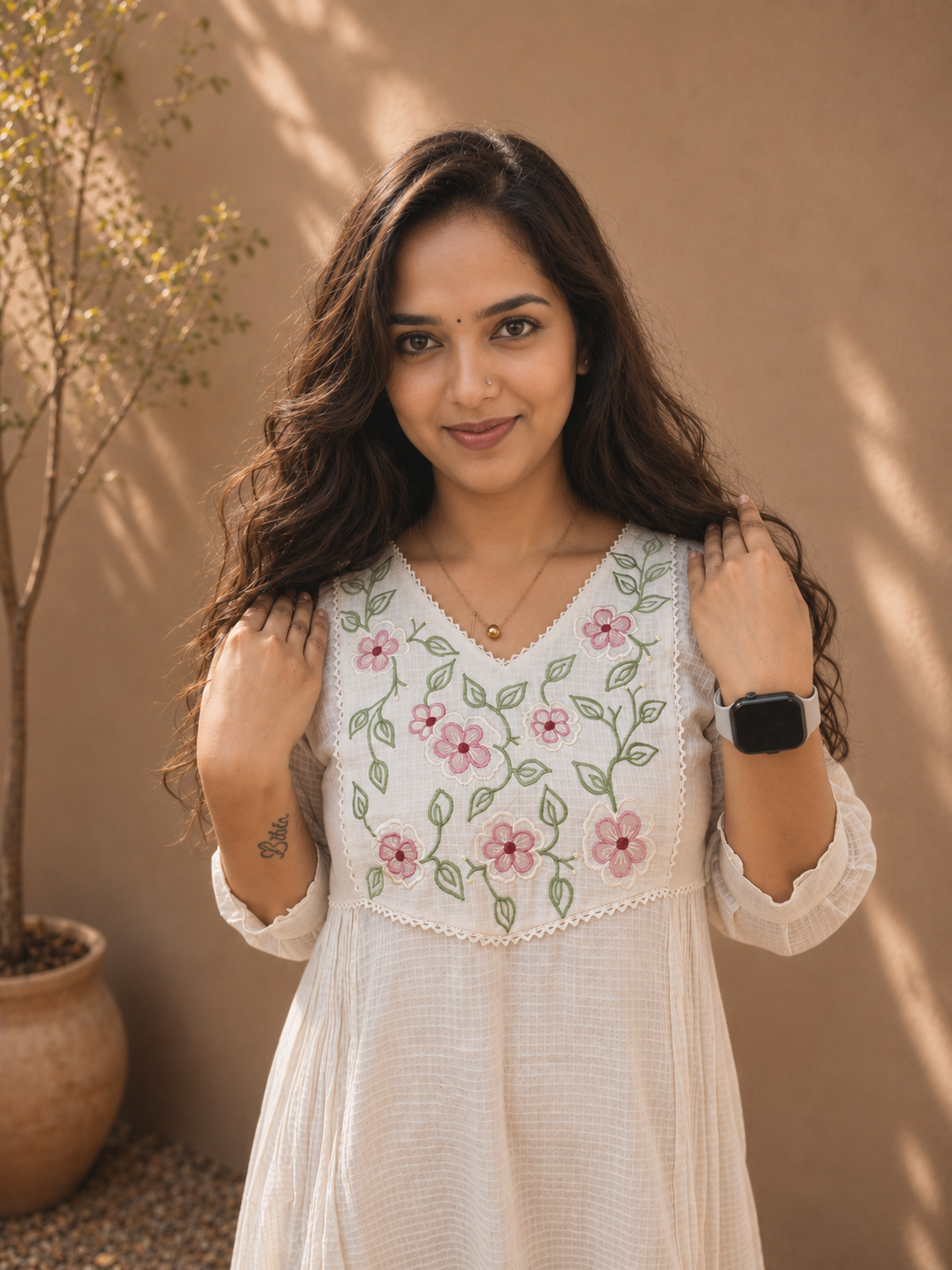 Soft cotton kota checks Aline kurti with multi colour thread embroidered yoke highlighted with scalloped lace MBS-1266