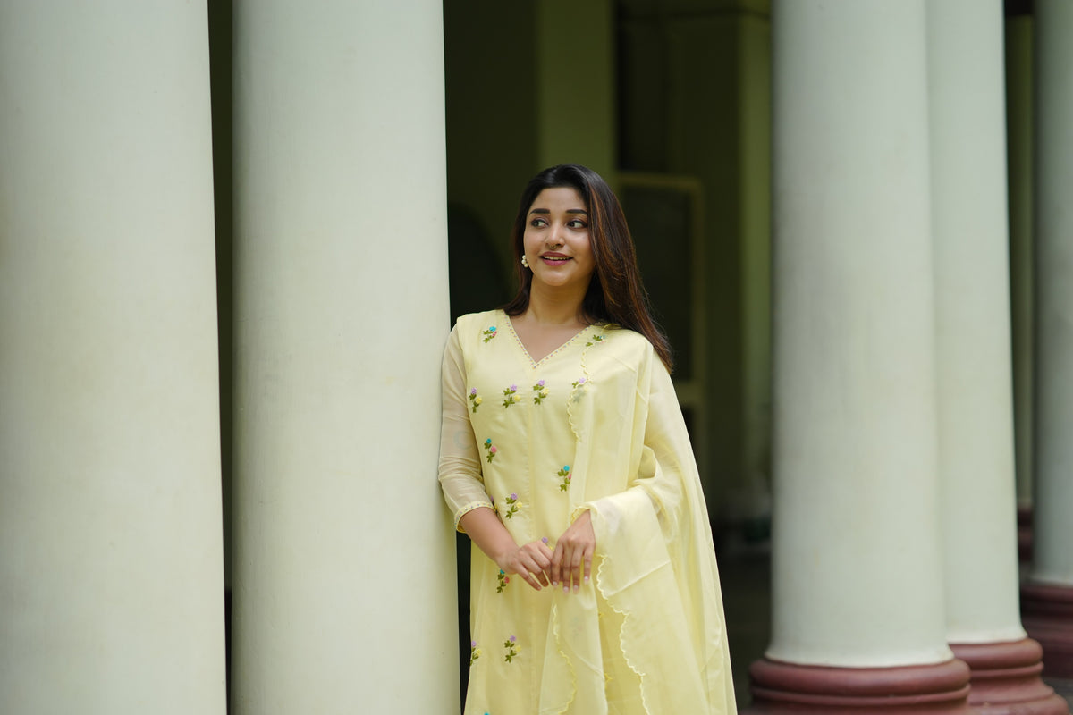 Pale yellow soft organza panel cut Aline Kurti with hand embroidery detailings and scallopped dupatta MBS-1308