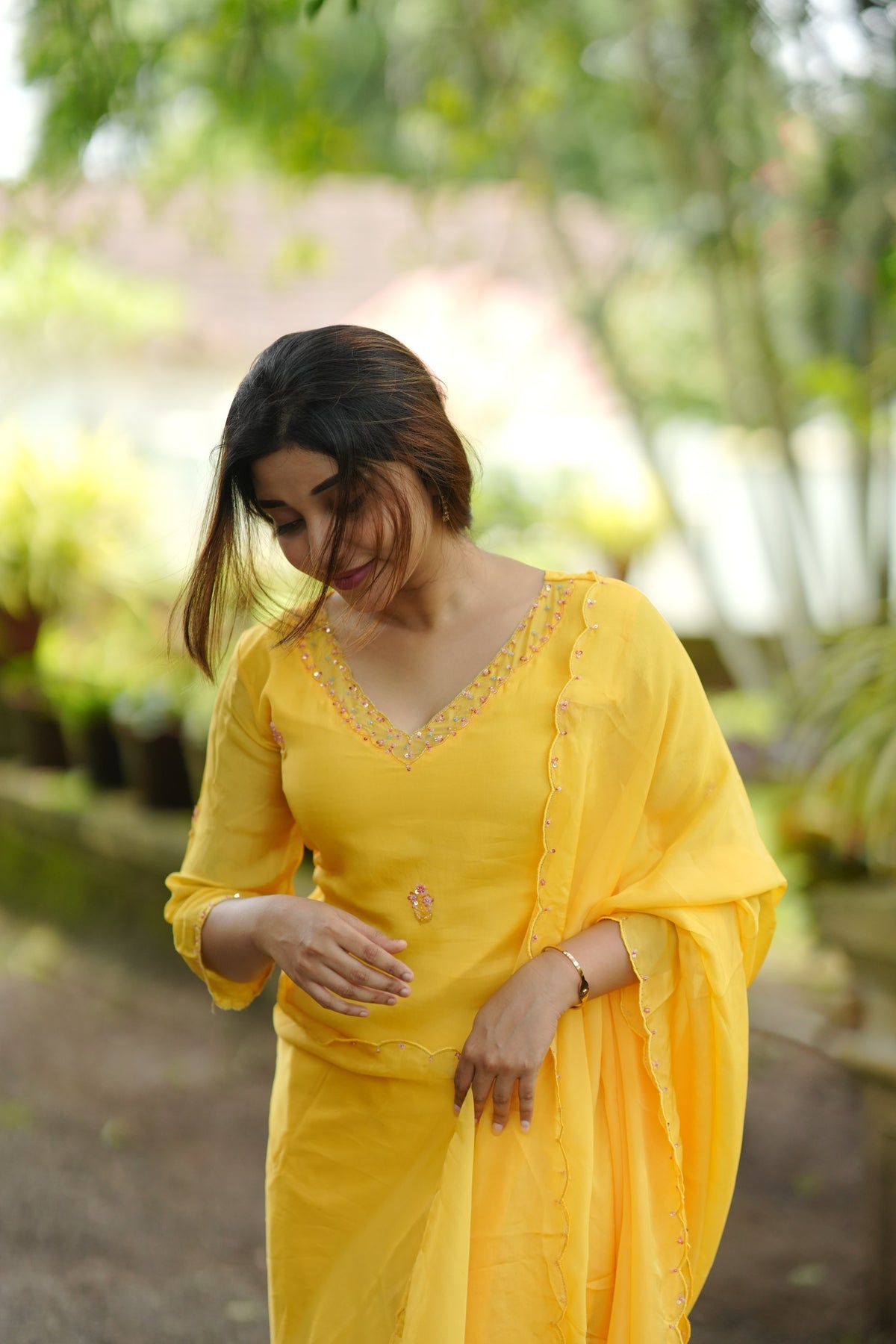Yellow viscose organza partywear kurti with hand embroidered top and dupatta paired with santoon fabric for bottom MBS-1335