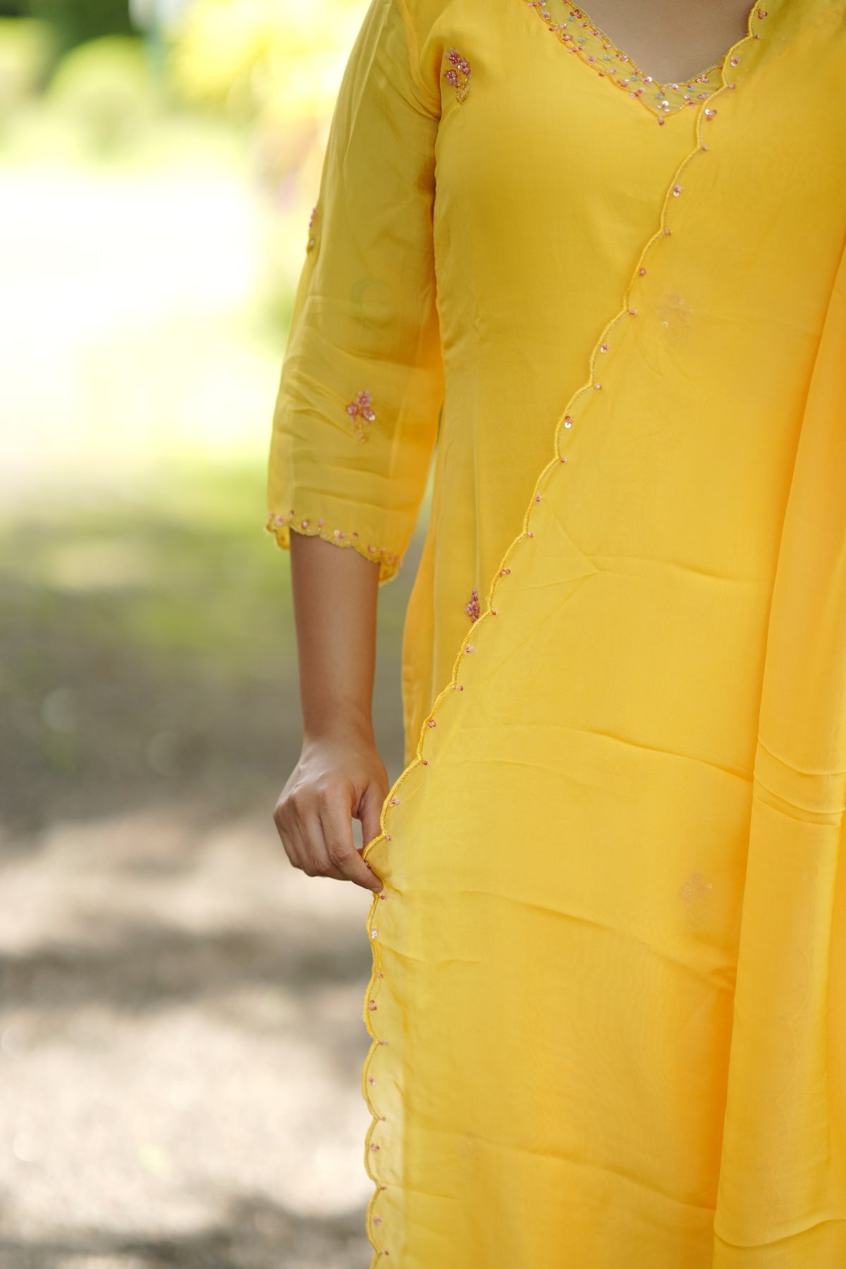 Yellow viscose organza partywear kurti with hand embroidered top and dupatta paired with santoon fabric for bottom MBS-1335