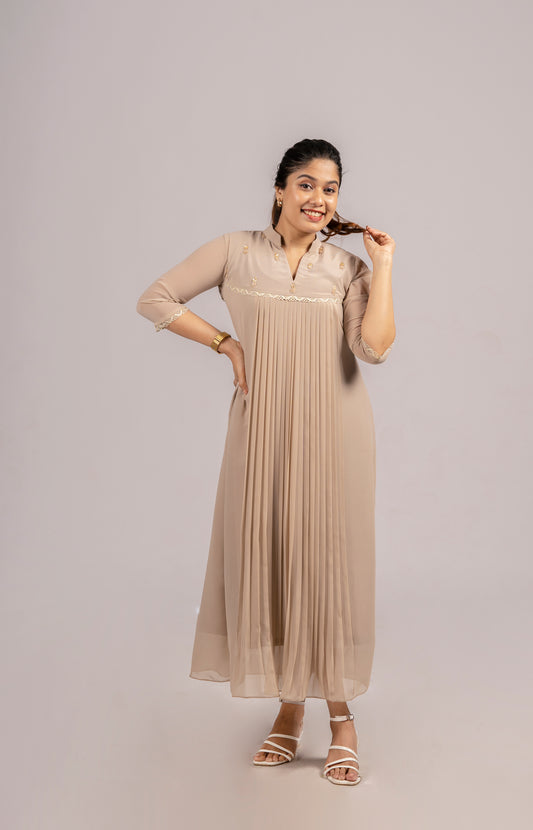 Beige shaded georgette A-line kurti with handworked yoke and lace detailing MBS-254