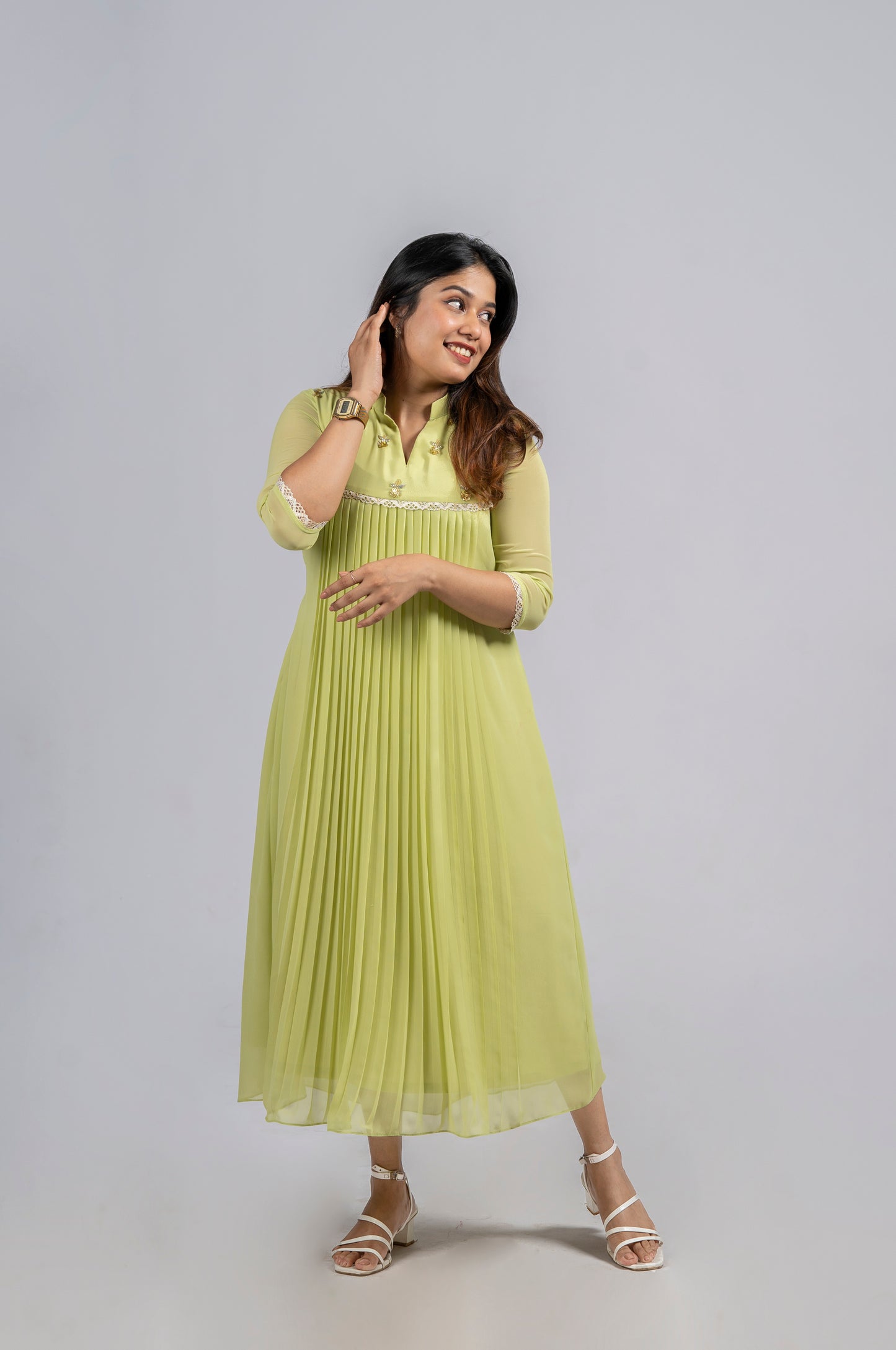 Greenish yellow shaded georgette A-line kurti with handworked yoke and lace detailing MBS-255