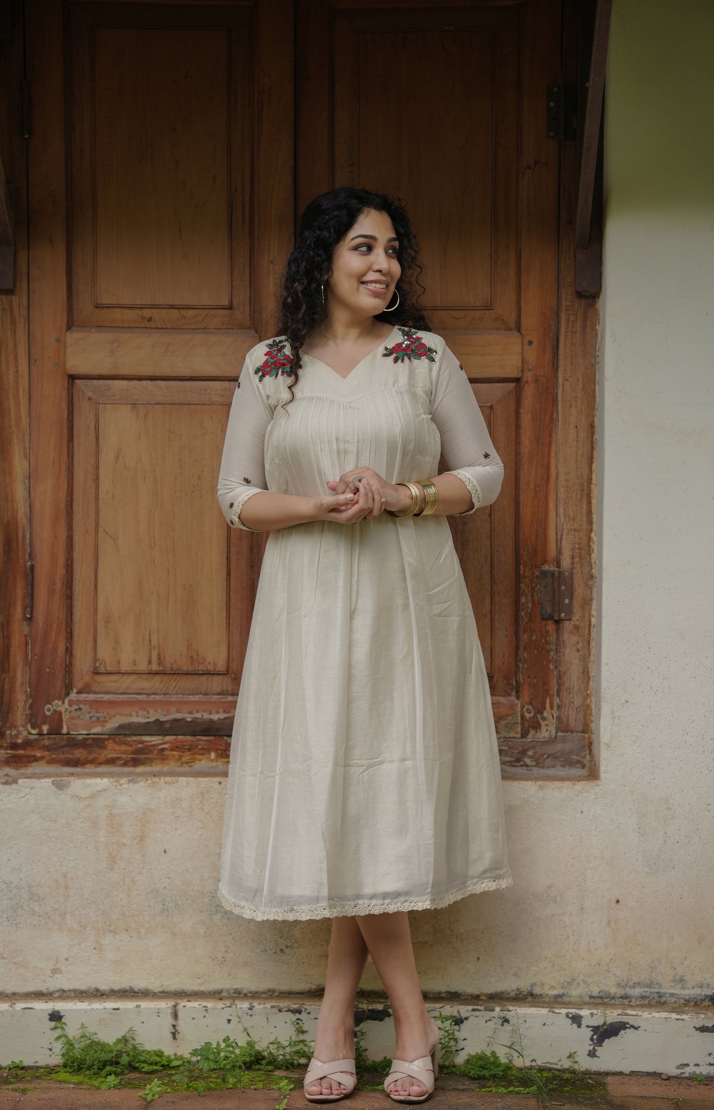 Golden thread weaved pure soft muslin  kurti/dress with handworked motifs on upper yoke MBS-632