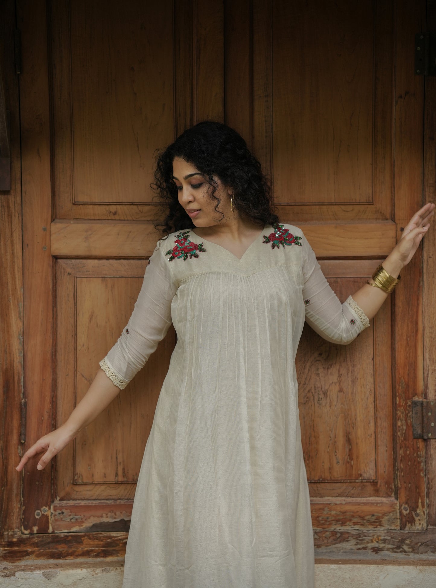 Golden thread weaved pure soft muslin  kurti/dress with handworked motifs on upper yoke MBS-632