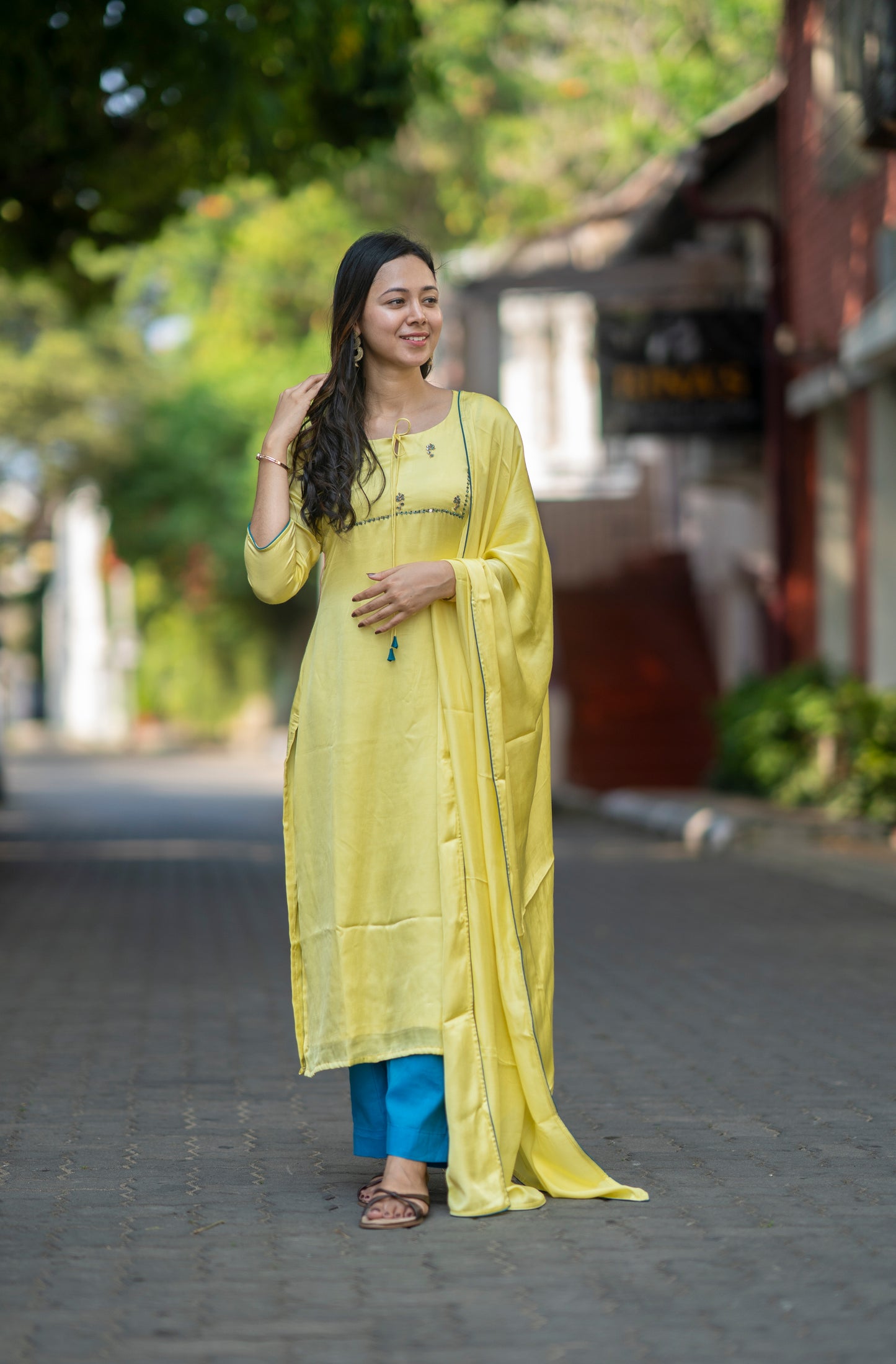 Yellow shaded satin modal slitted kurti with handworked front and back yoke with santoon lining MBS-580