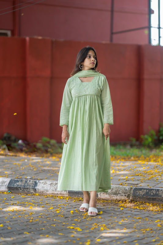 Pista green shaded Kora mul cotton A-line kurti with handwork detailed yoke MBS-581