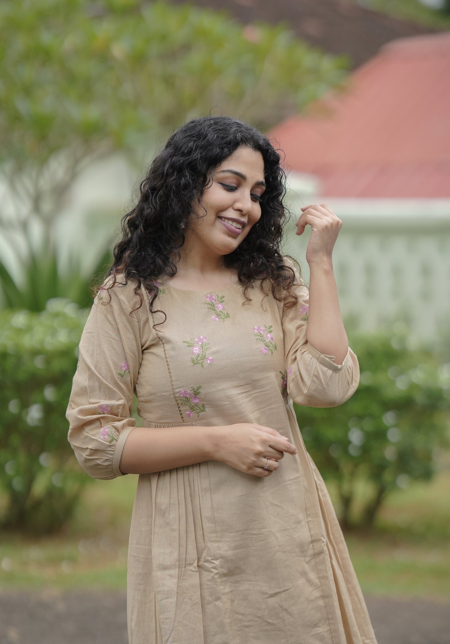 Cotton flex  kurti/dress with floral embroidery detailings on yoke and sleeves in dark beige shade MBS-638