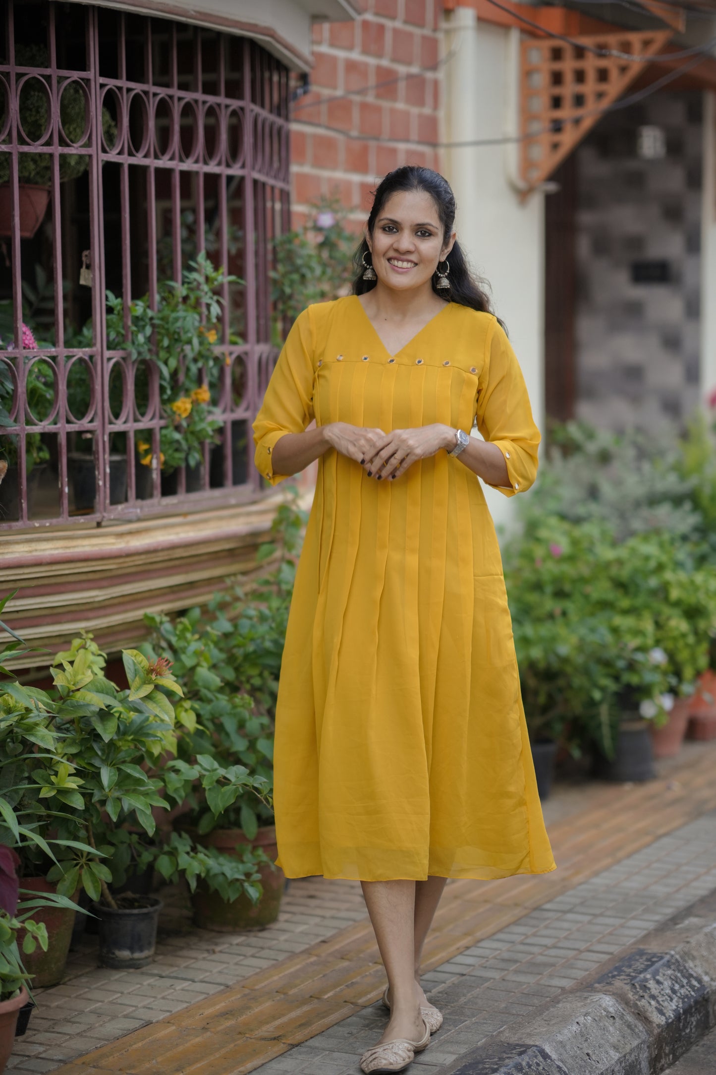 Yellow shaded georgette Aline kurti with mirror handworked yoke and sleeve MBS-775