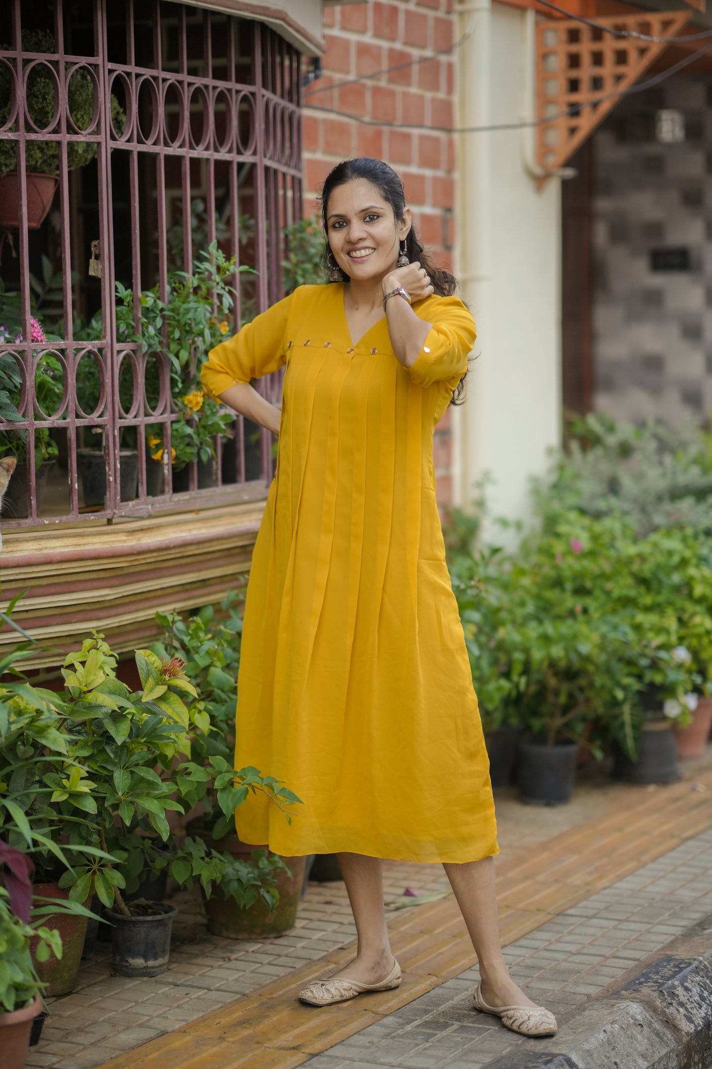 Yellow shaded georgette Aline kurti with mirror handworked yoke and sleeve MBS-775