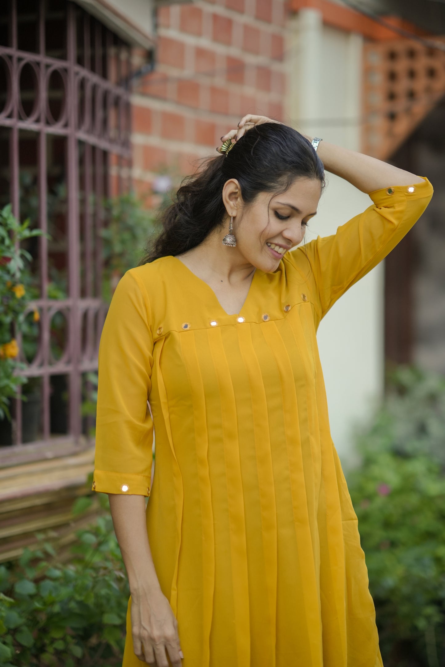 Yellow shaded georgette Aline kurti with mirror handworked yoke and sleeve MBS-775