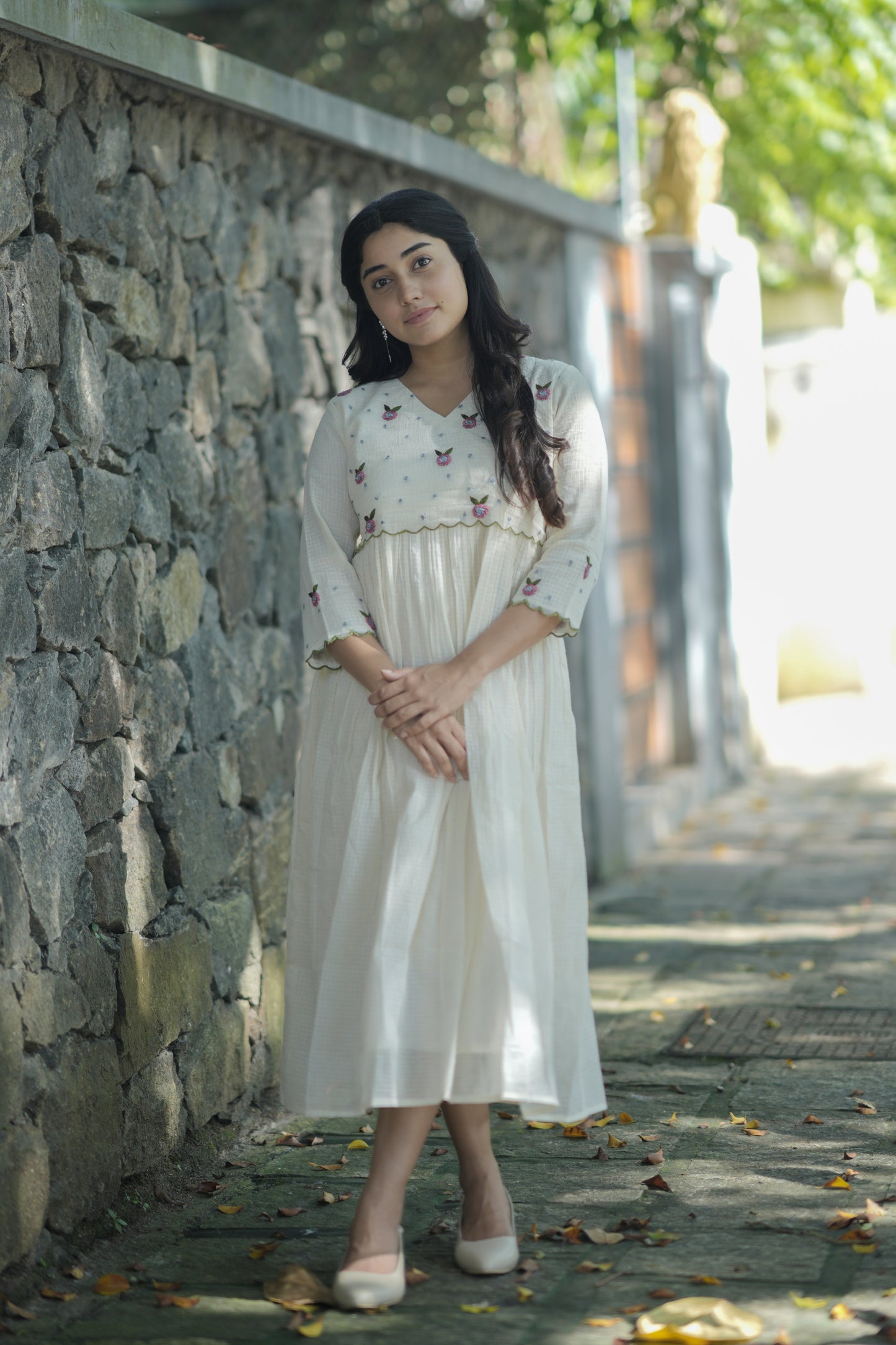 Off white soft cotton kota checks kurti/dress with overlapped yoke enriched with hand embroidery detailings MBS-708