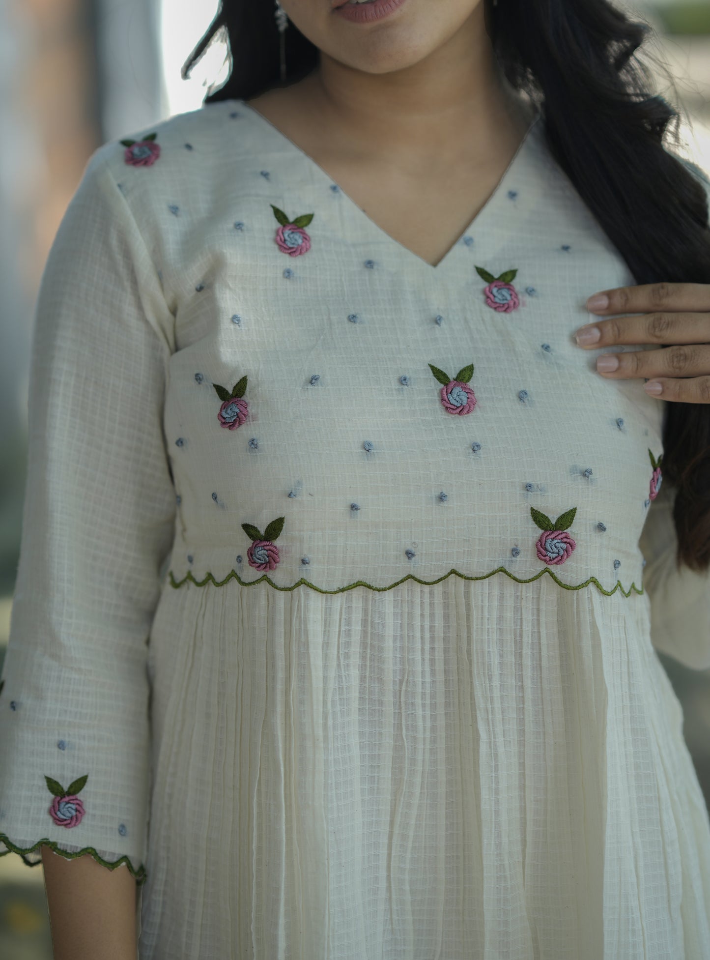 Off white soft cotton kota checks kurti/dress with overlapped yoke enriched with hand embroidery detailings MBS-708