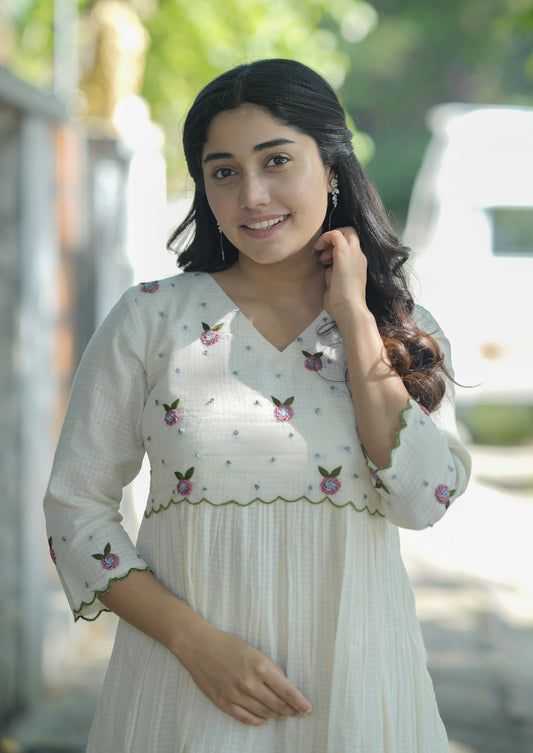 Off white soft cotton kota checks kurti/dress with overlapped yoke enriched with hand embroidery detailings MBS-708