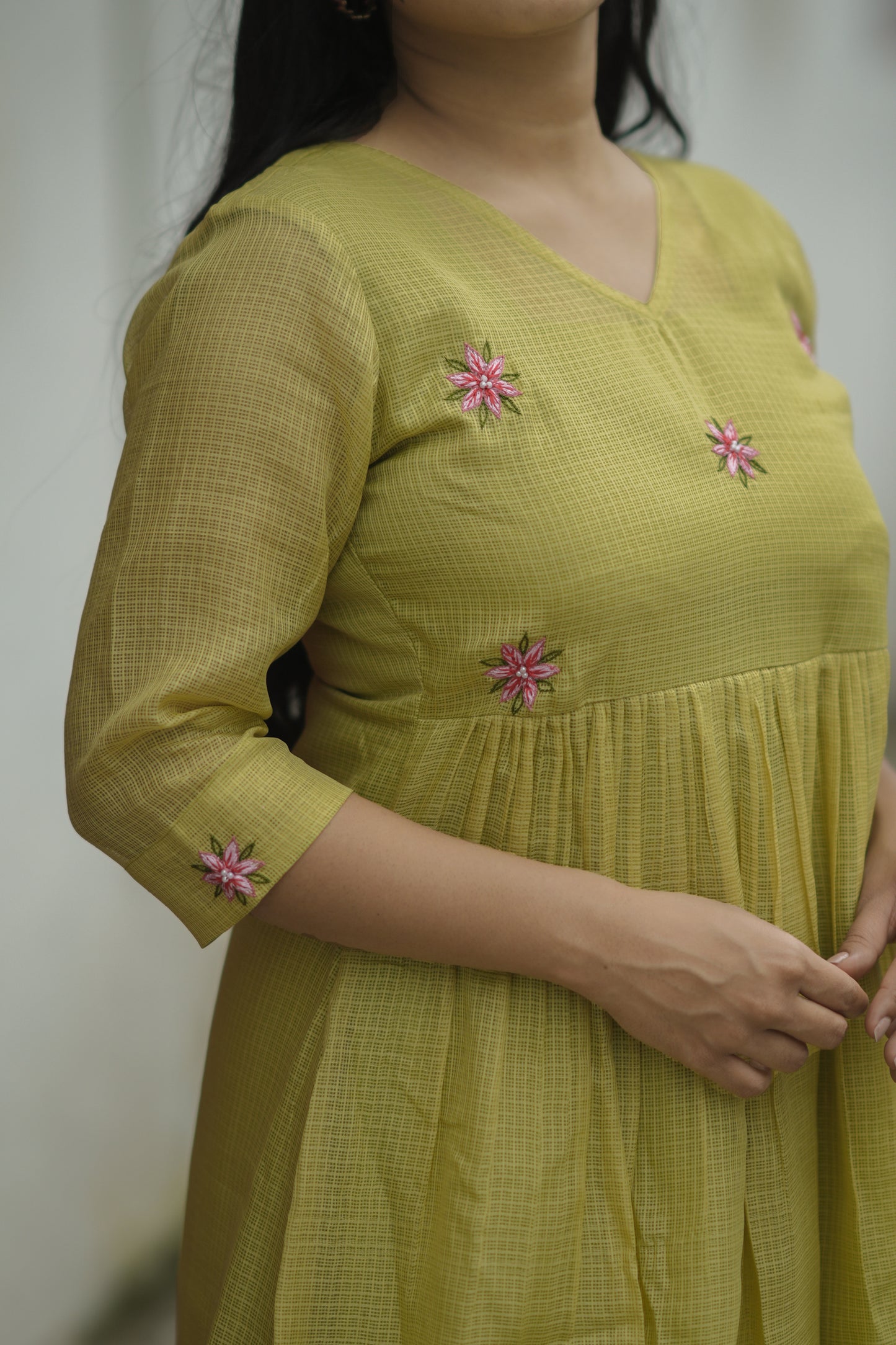 Green semi kota checks kurti with floral embroidered yoke and gathers MBS-709