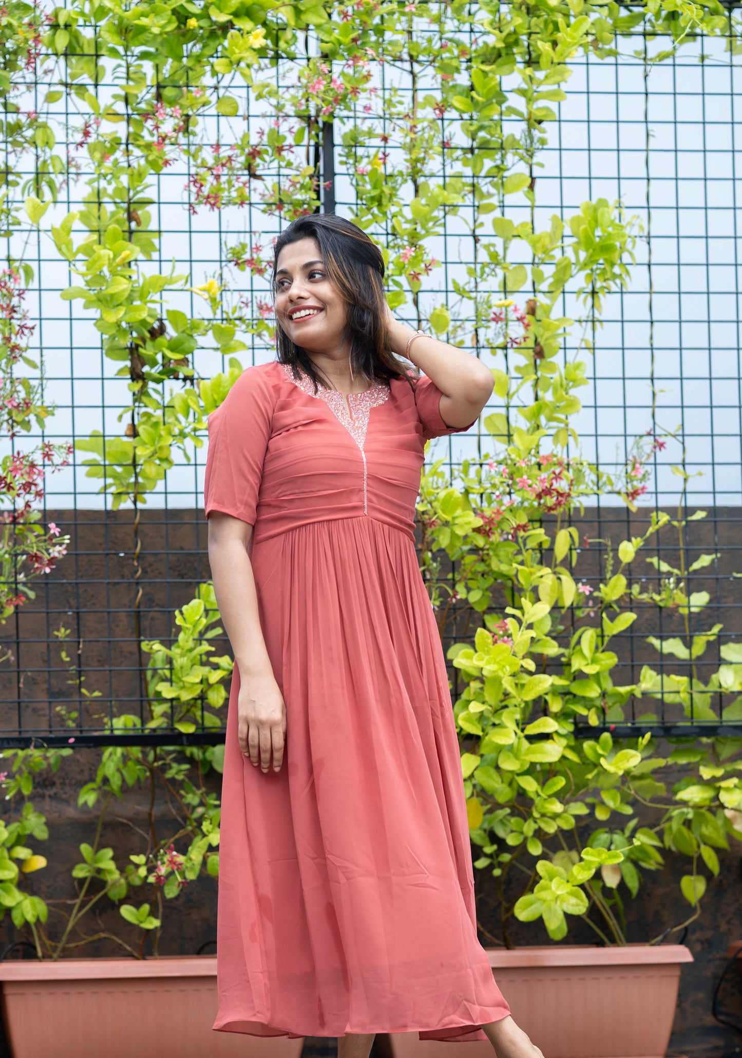 Dark peach georgette A-line kurti with pleated yoke embellished with cut beads and sequins work MBS-378