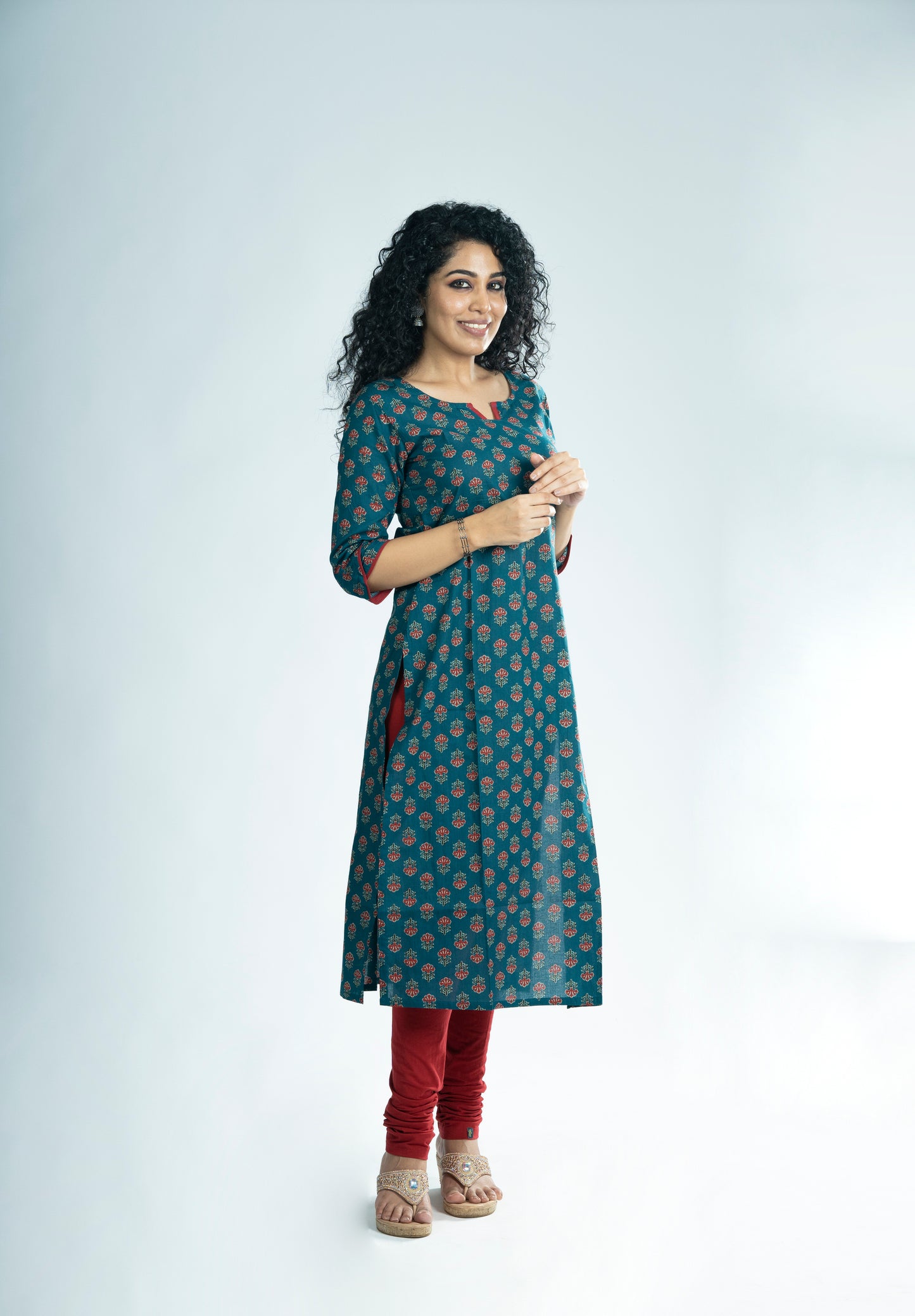 Floral printed cotton slitted kurti with overlapped sleeve end in dark teal blue shade  MBS-R247