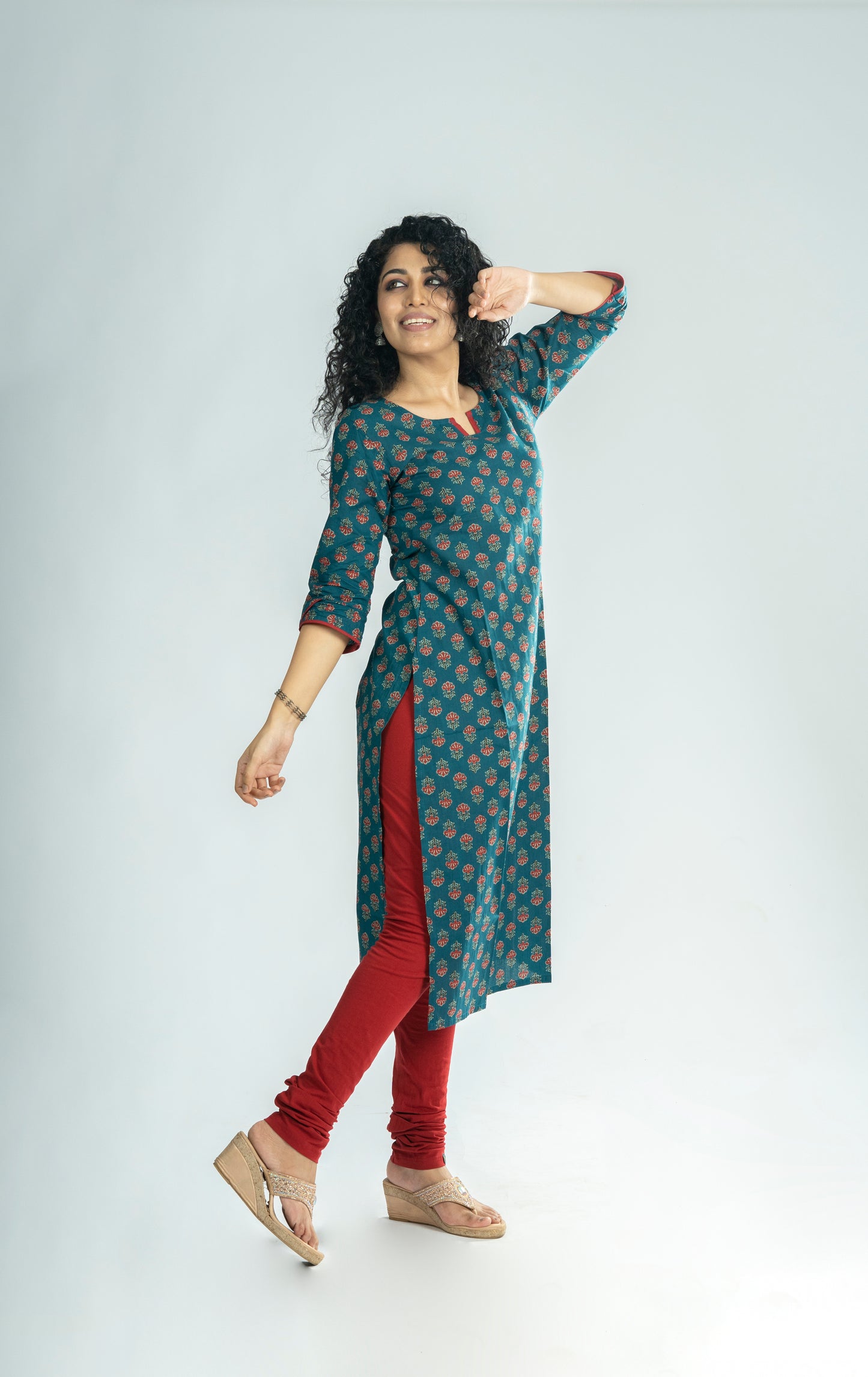 Floral printed cotton slitted kurti with overlapped sleeve end in dark teal blue shade  MBS-R247