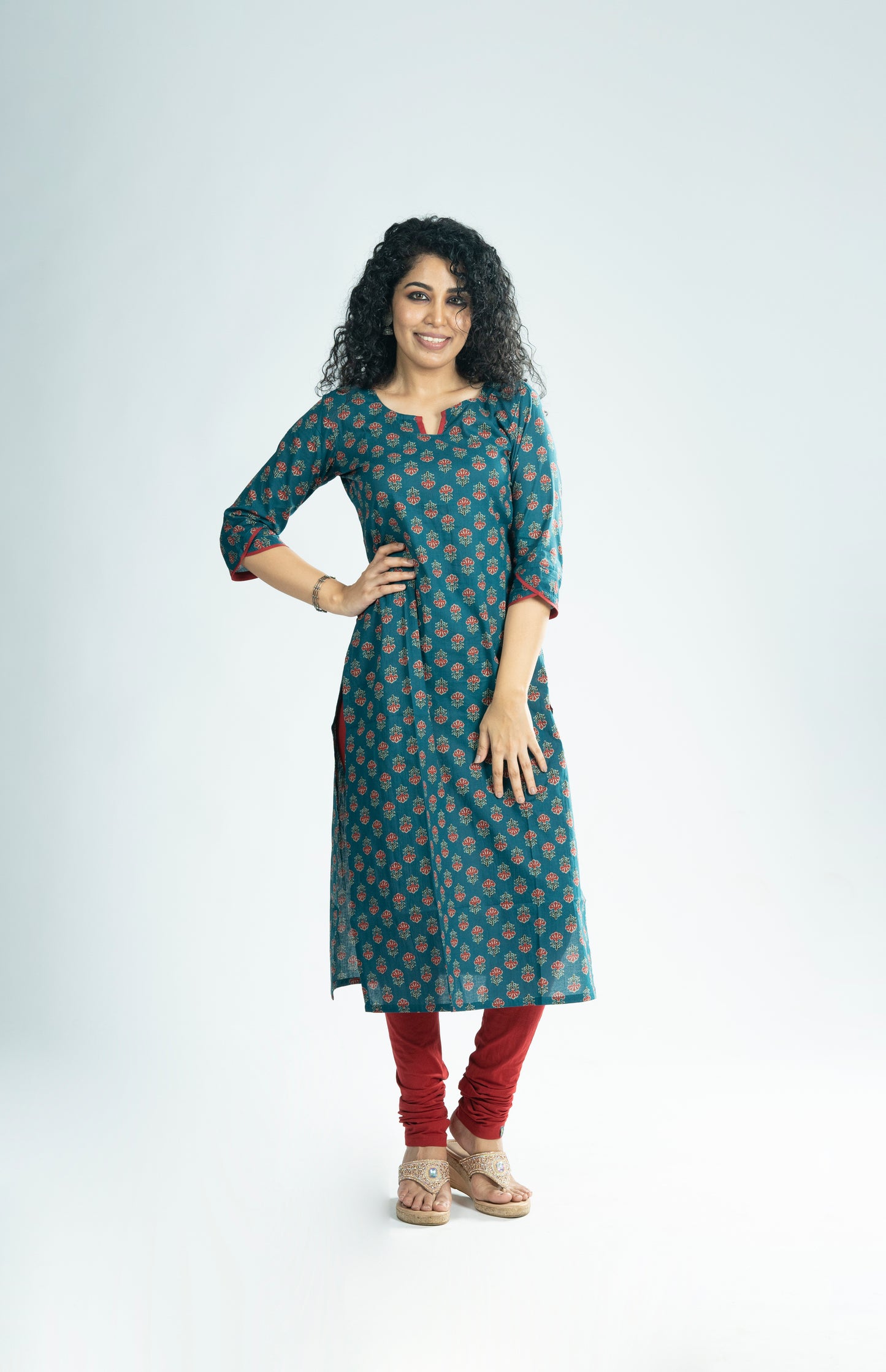 Floral printed cotton slitted kurti with overlapped sleeve end in dark teal blue shade  MBS-R247
