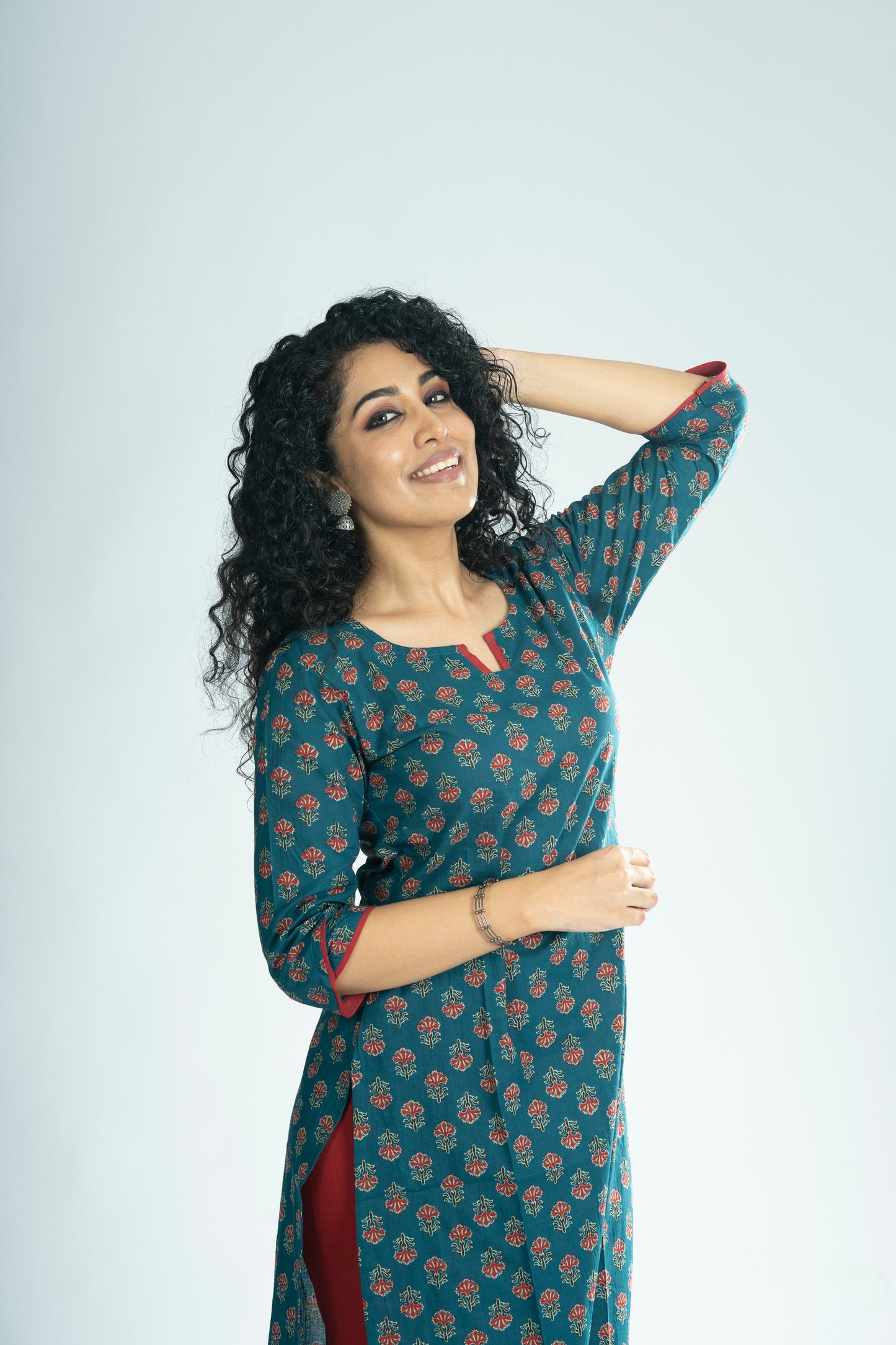 Floral printed cotton slitted kurti with overlapped sleeve end in dark teal blue shade  MBS-R247