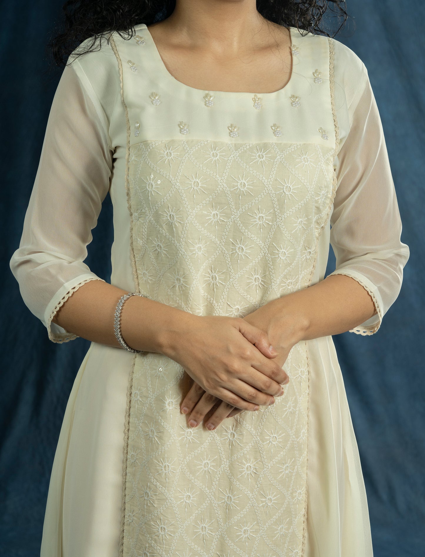 Off-white georgette A-line kurti with handworked neck and chikenkari panel with crochet lace detailing MBS-R199