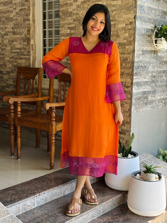 Orange shaded viscose organza A-line kurti/dress with cutwork and scallop detailings MBS-1188